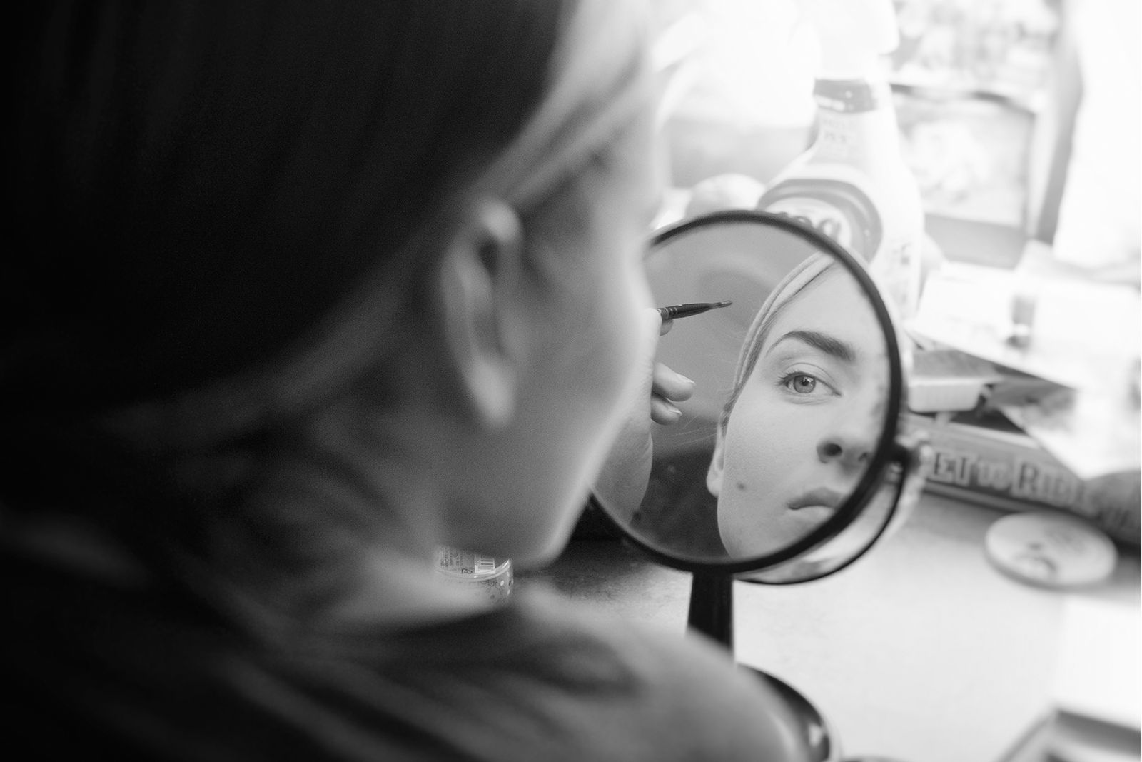 © Lieh Sugai - Miss Paulina puts on makeup and prepares for the act in her trailer.