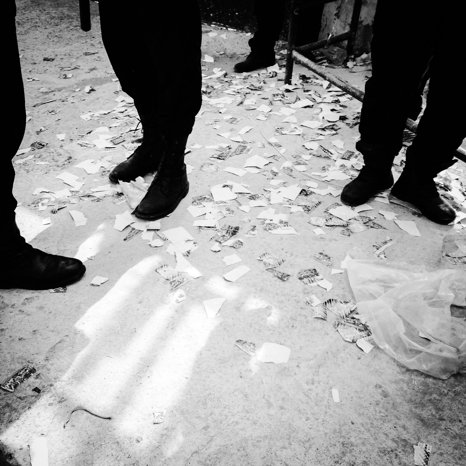 © Fethi Sahraoui - Teared tickets and riots police.