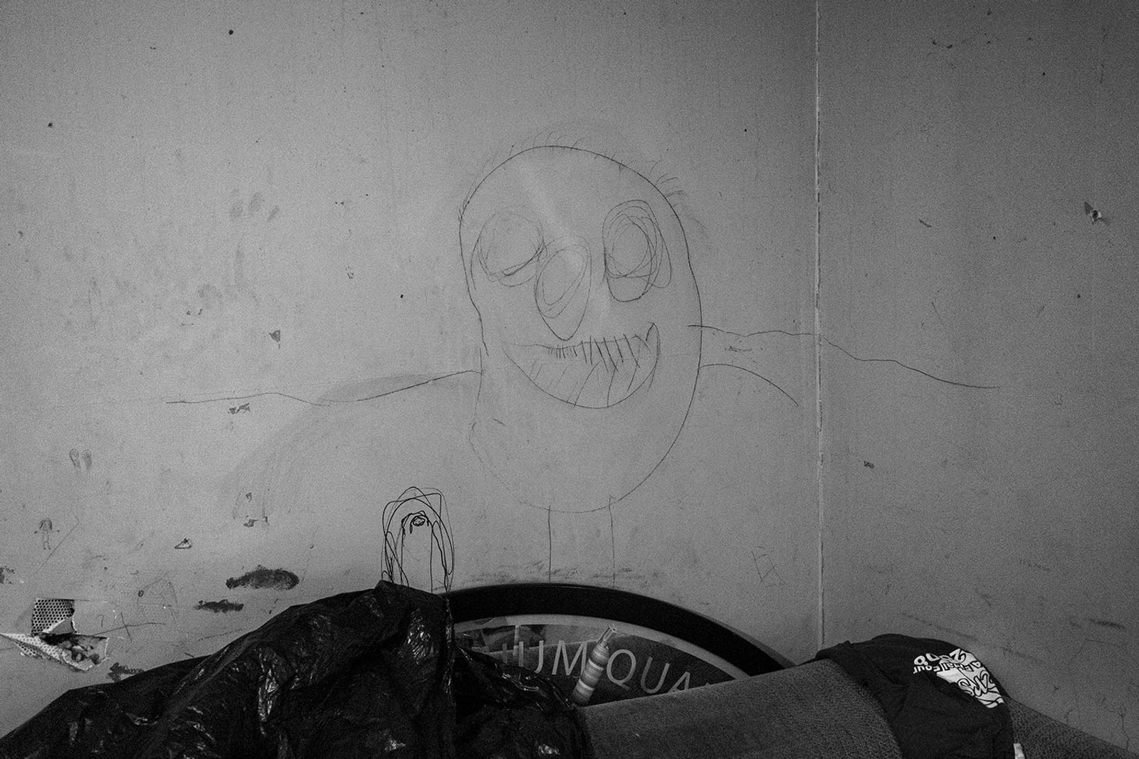© Jared Ragland - Meth Monster drawing on a wall inside a trailer.