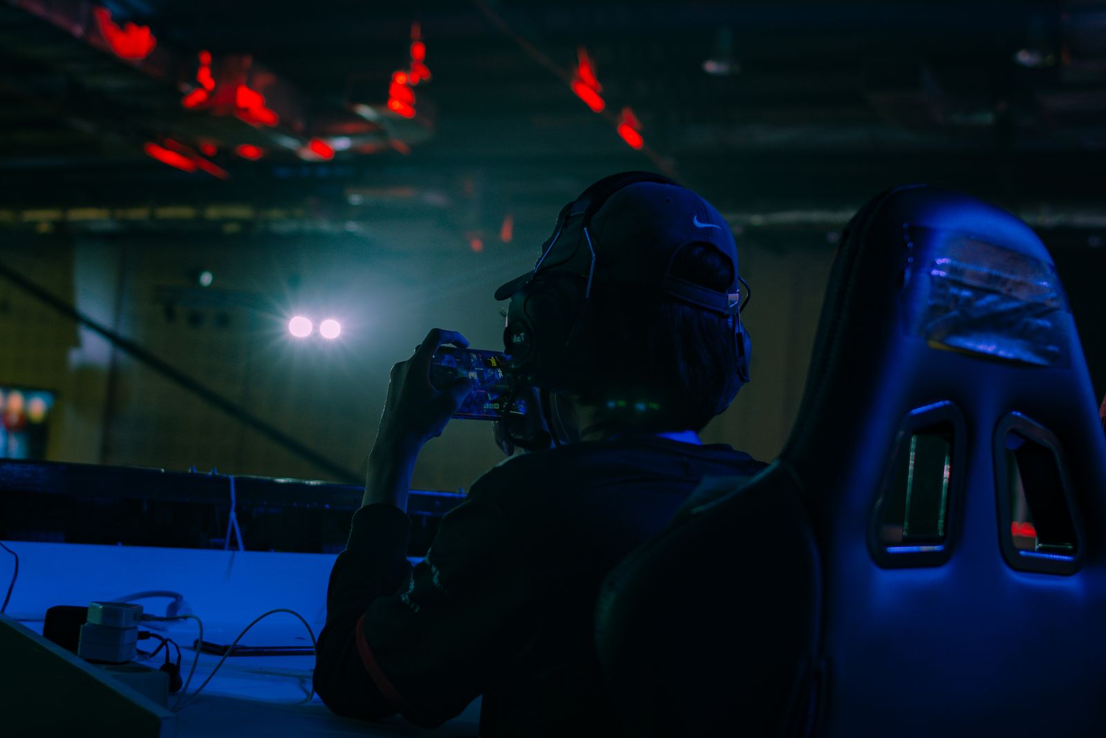© Hafitz Maulana - A pro gamer competing in Indonesia interclub e-Sport tournament, held in a ballroom in South Jakarta, in mid-December 2019.