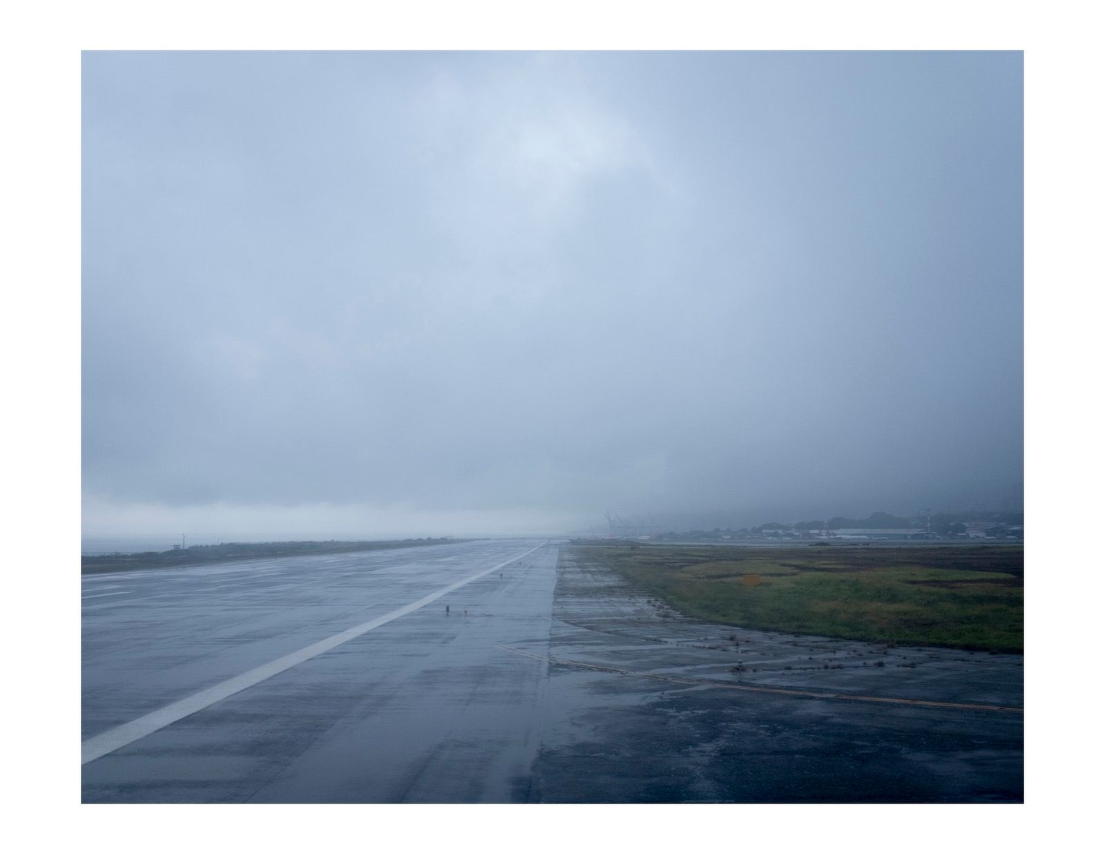 © Andrea Hernández Briceño - The Simon Bolivar International Airport landing track in the rain in Maiquetia, Venezuela, on July 30, 2018