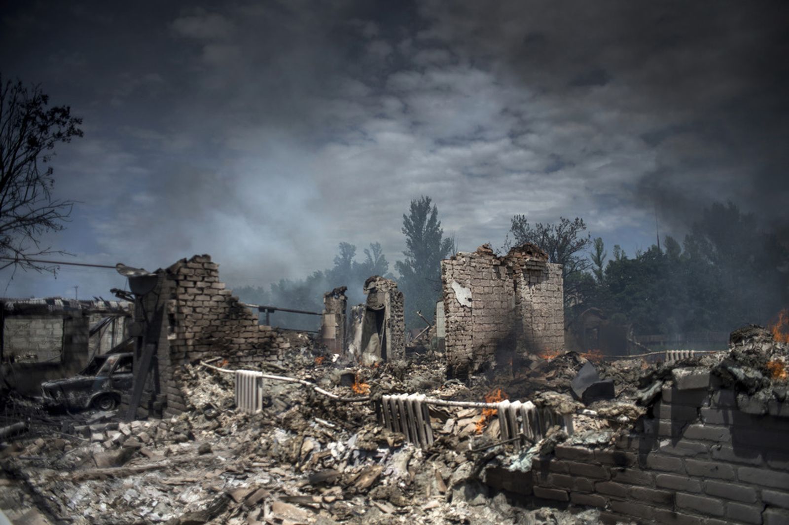 © Valery Melnikov - A house destroyed during an air attack in the village of Luhanskaya