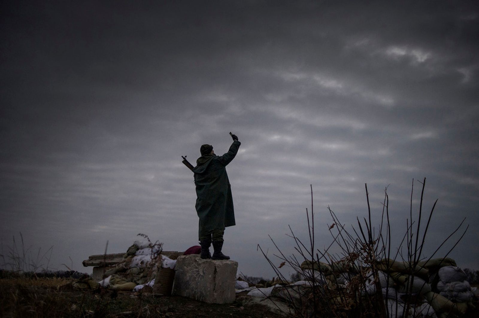 © Valery Melnikov - The pro-russian rebel trying to catch a signal near the frontline