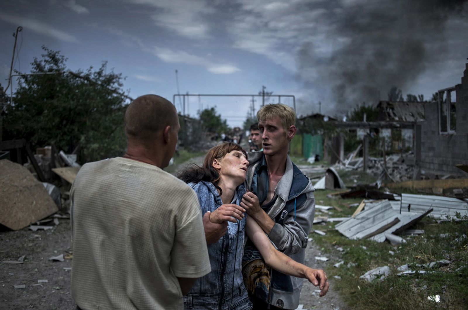 © Valery Melnikov - A citizens in the village of Luhanskaya after the air attack