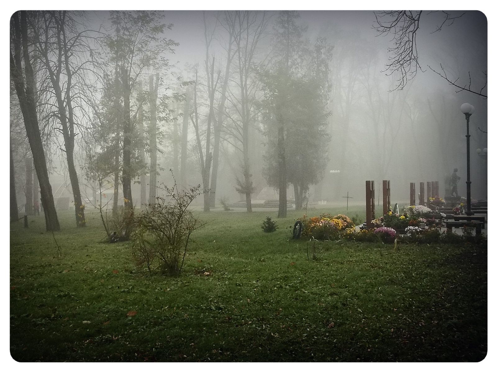 © Andrei  Kolyaskin - Foggy  morning  in  Memorial  Square  of  Ivano - Frankivsk  City , Ukraine .