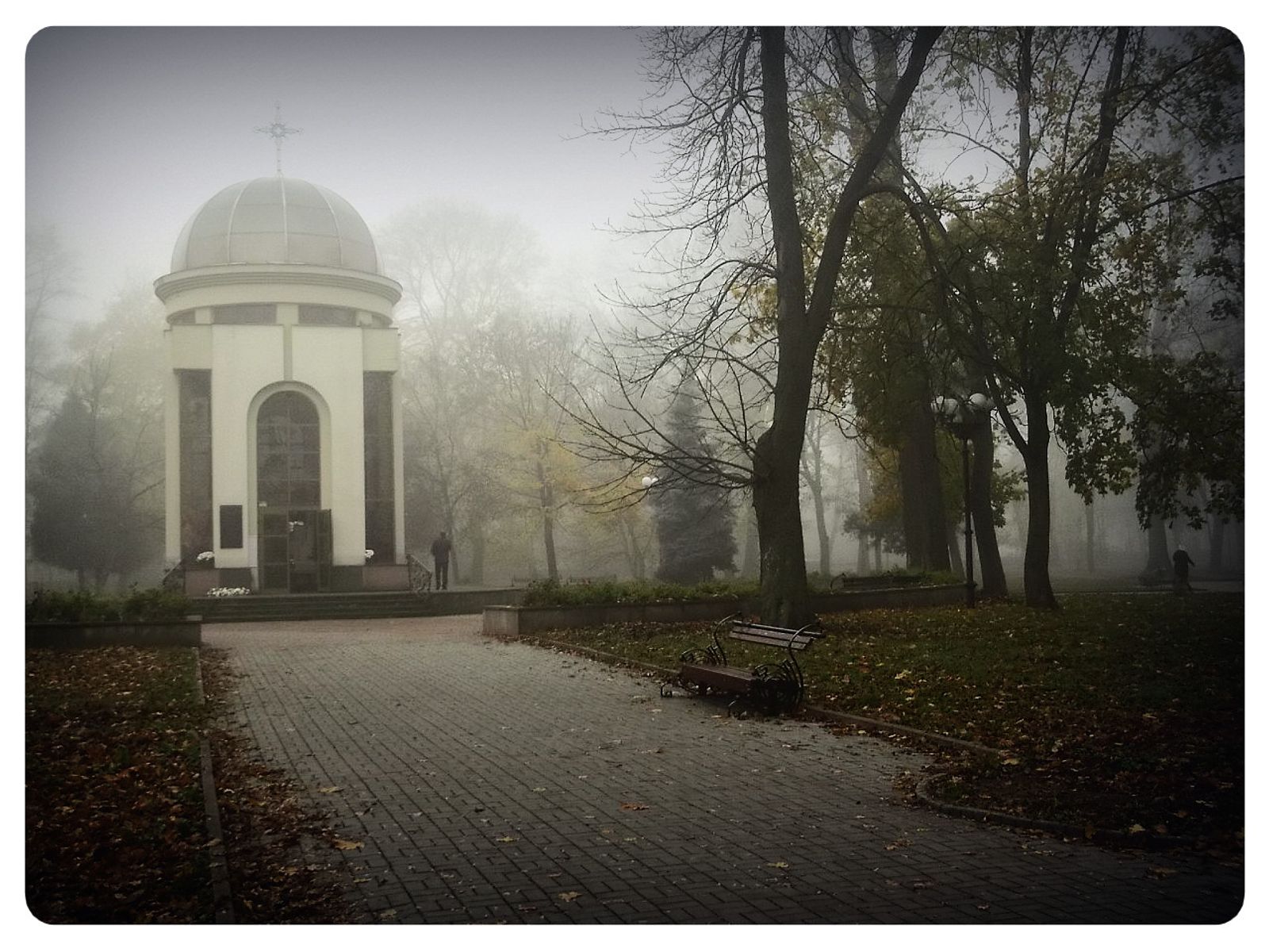 © Andrei  Kolyaskin - Foggy  morning  in  Memorial  Square  of  Ivano - Frankivsk  City , Ukraine .