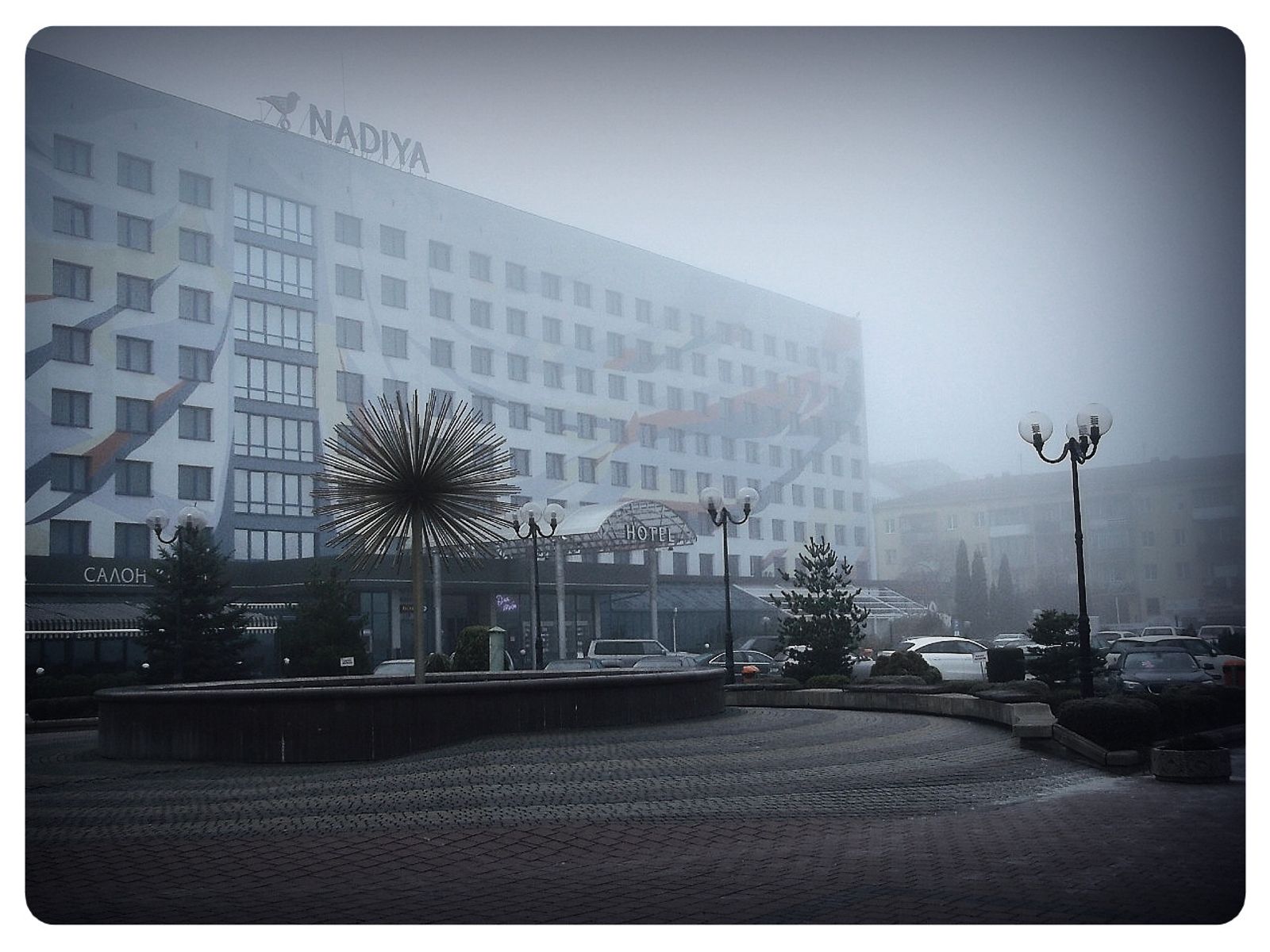 © Andrei  Kolyaskin - Foggy  morning  in  Ivano - Frankivsk  City , Ukraine .