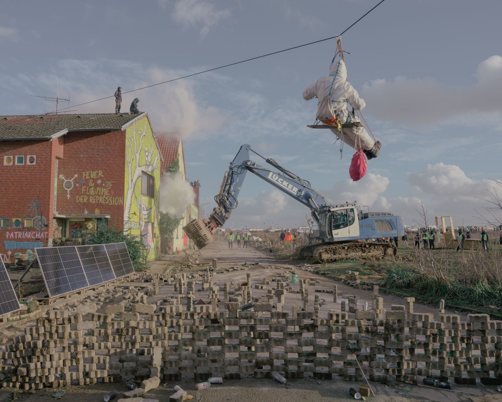 © Ingmar Björn Nolting - An excavator clears barricades on the first day of the eviction of Lützerath, Germany on January 11, 2023.