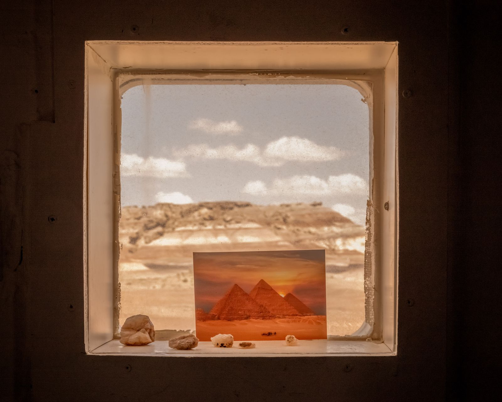 © Kris Davidson - Snapshot of the Pyramids at Giza in a window of the Mars Desert Research Station.