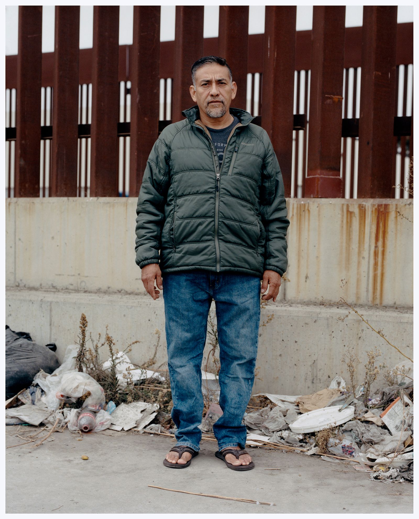 © Noel Quintela - Uncle posing in front of the wall, Tijuana BC, México, 2023.