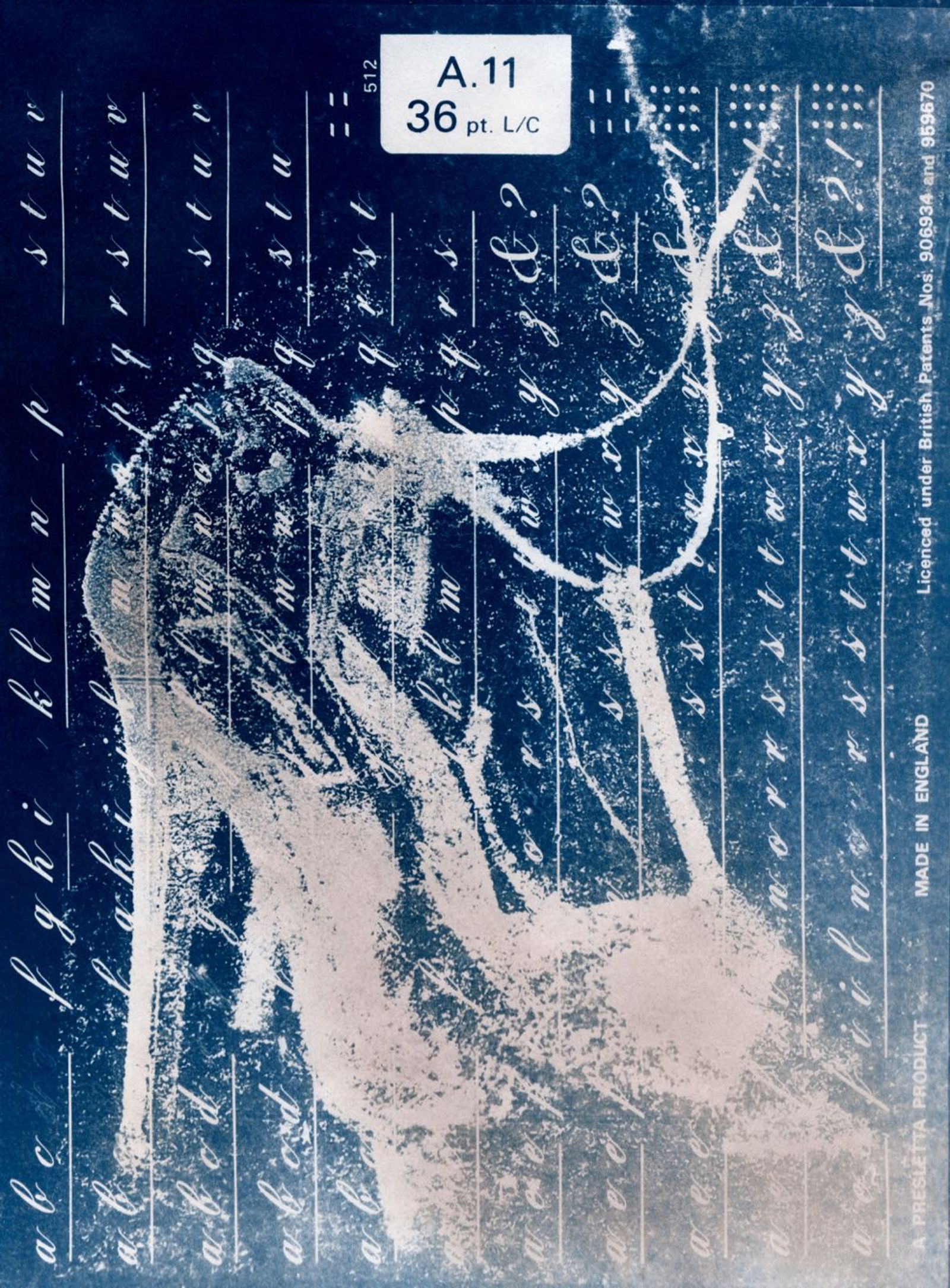© Jo Stapleton - impossible shoes with Letraset stencil photogram and teabag tinted toes (Cyanotype print)