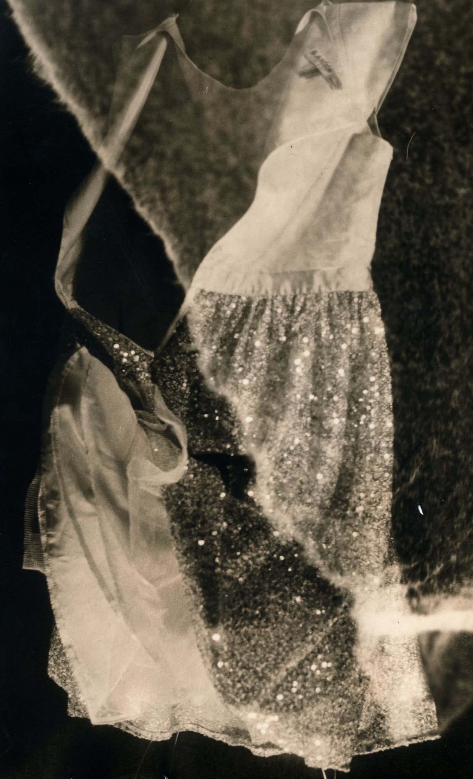 © Jo Stapleton - Child's party dress with tissue paper. Lith print (image exposed through torn tissue paper)