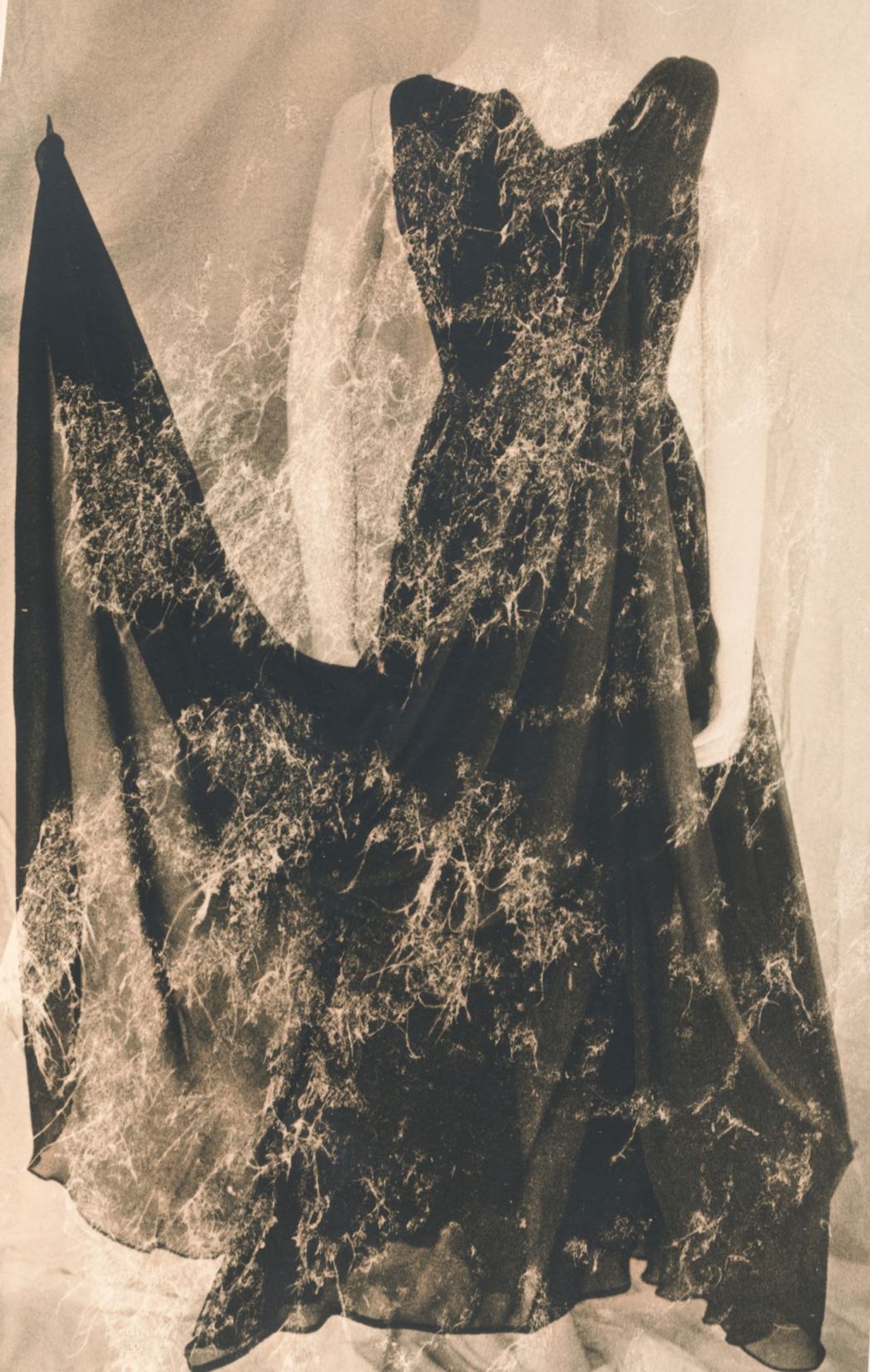 © Jo Stapleton - Evening dress suspended with fishing wire on Mannequin 4 (Lith print with tissue paper photogram)