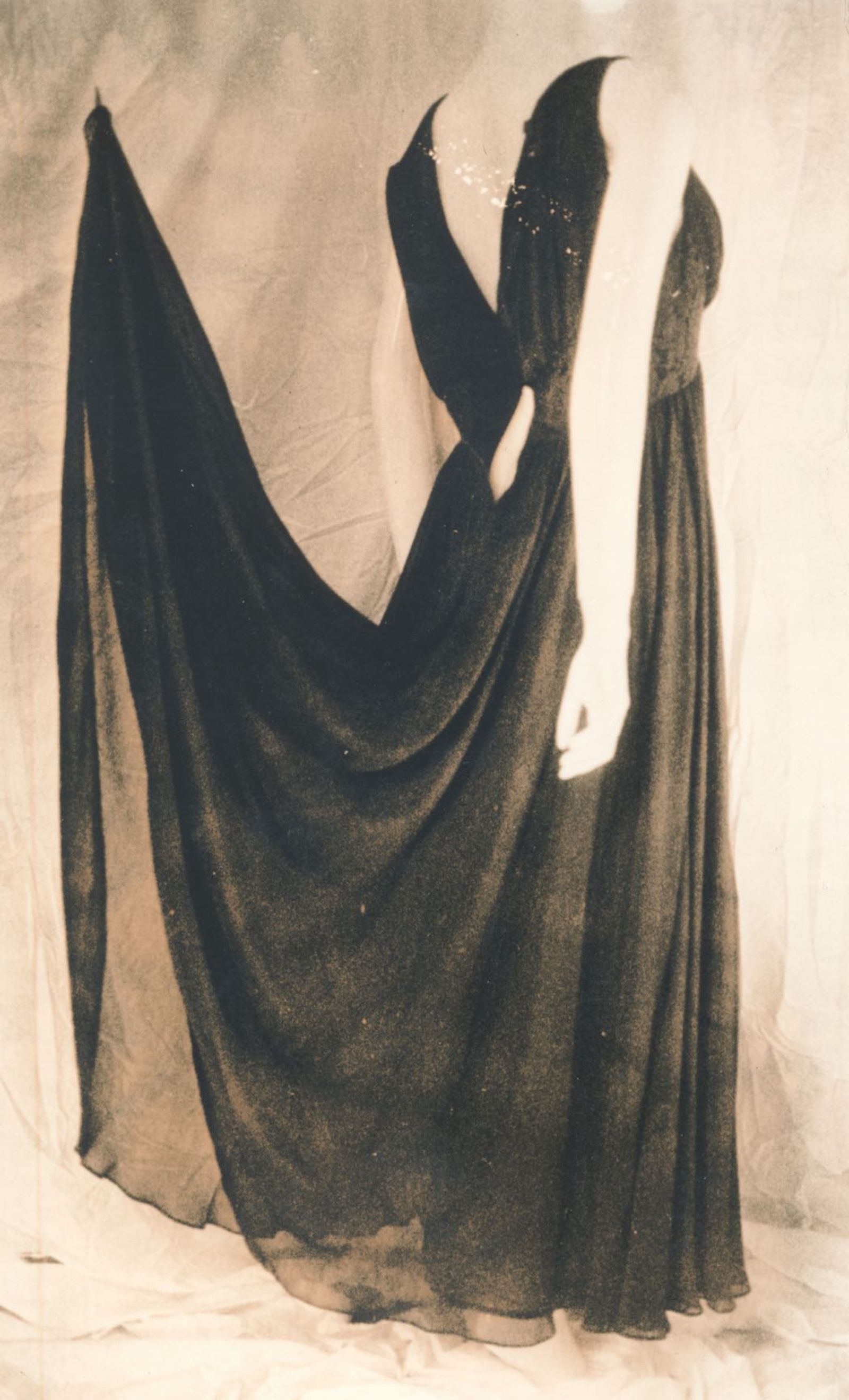 © Jo Stapleton - Evening dress suspended with fishing wire on Mannequin 1 (Lith print)