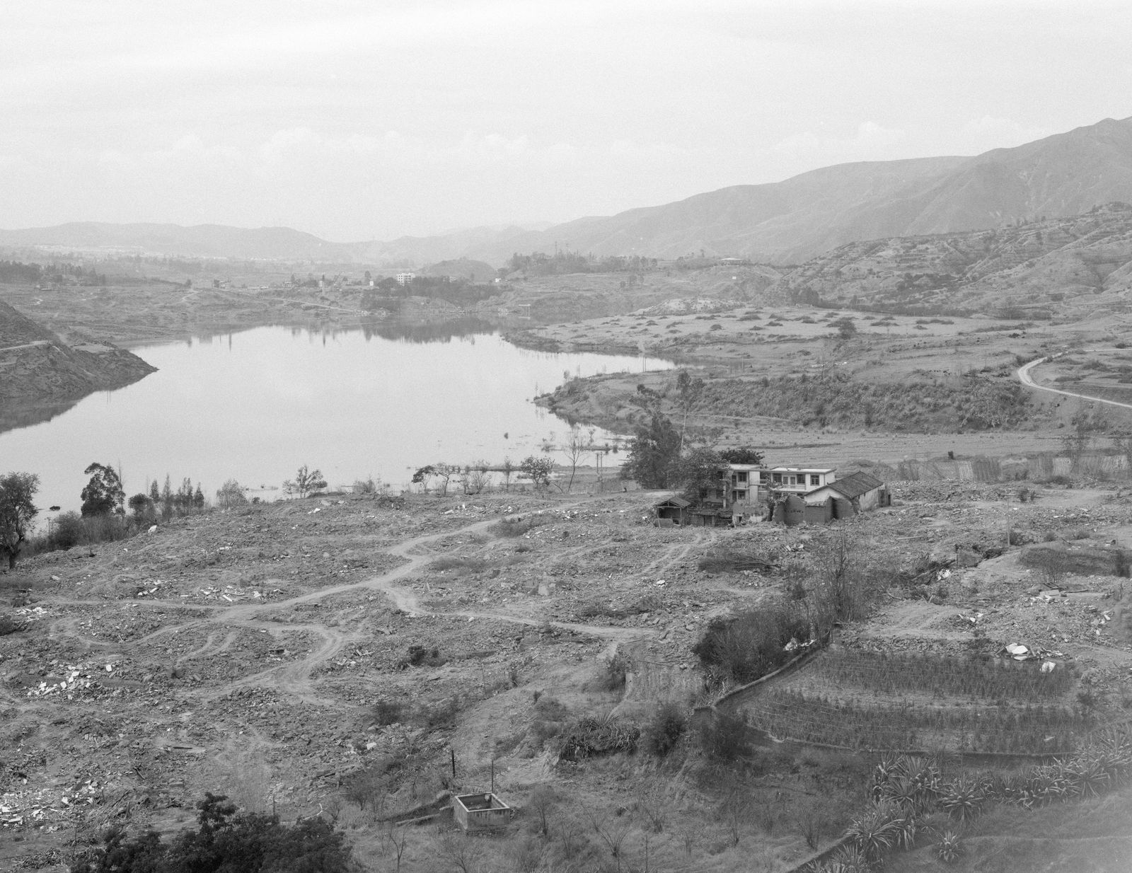 © Yexin Qiu & Moying Zhang - The villages demolished during the construction of the reservoir dam.