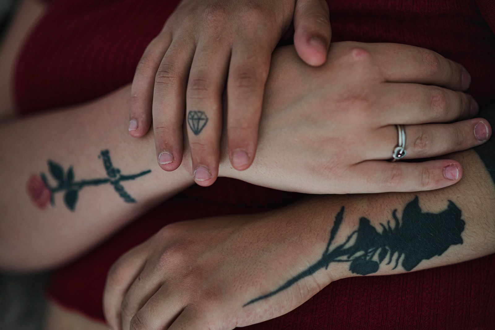 © Diana Bagnoli - Salvatore and Viviana's hands. They both tattooed a rose on their arm to reaffirm their love.
