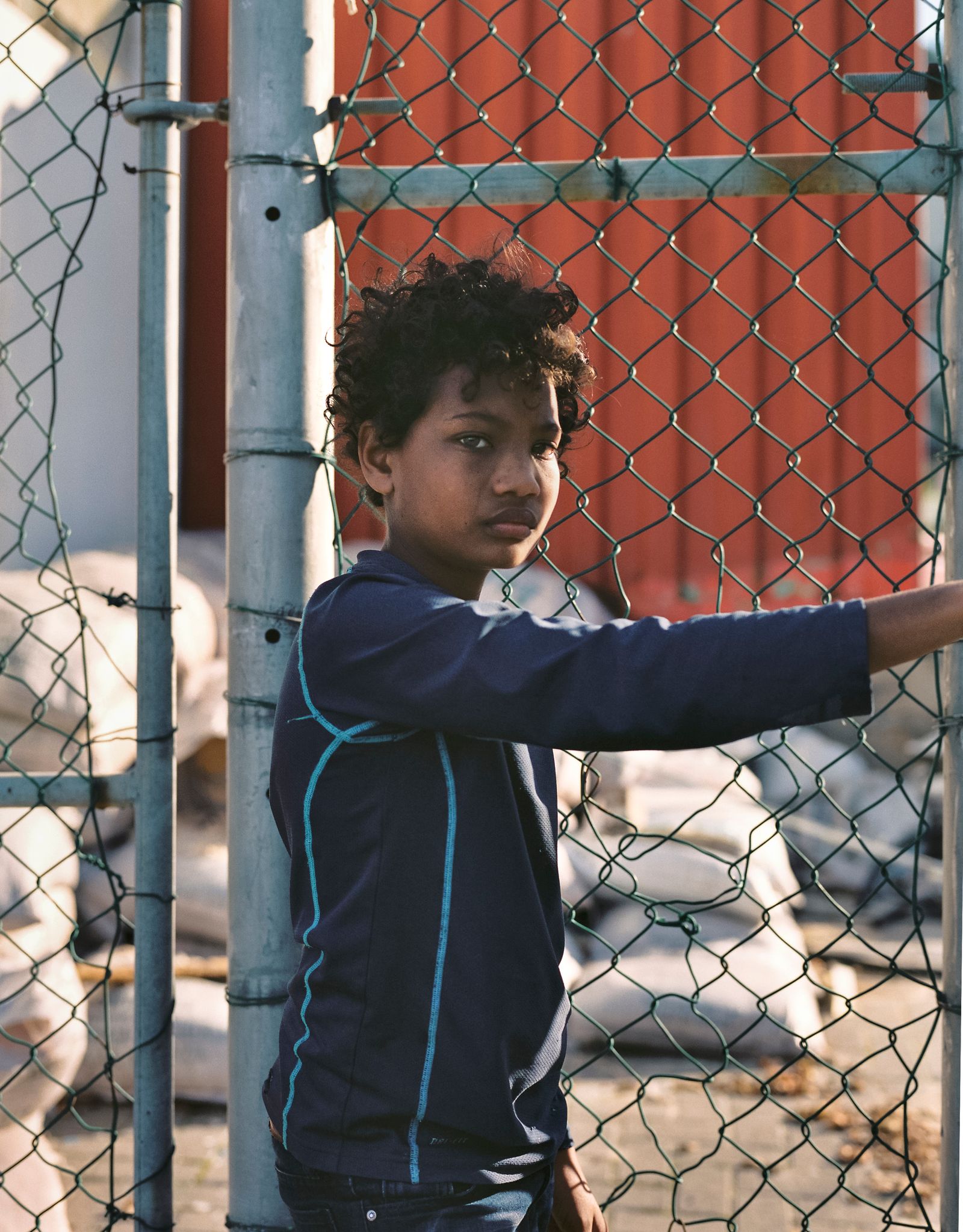 © Ayesha Kazim - A young boy stands for a portrait at the Bo Kaap Playground.