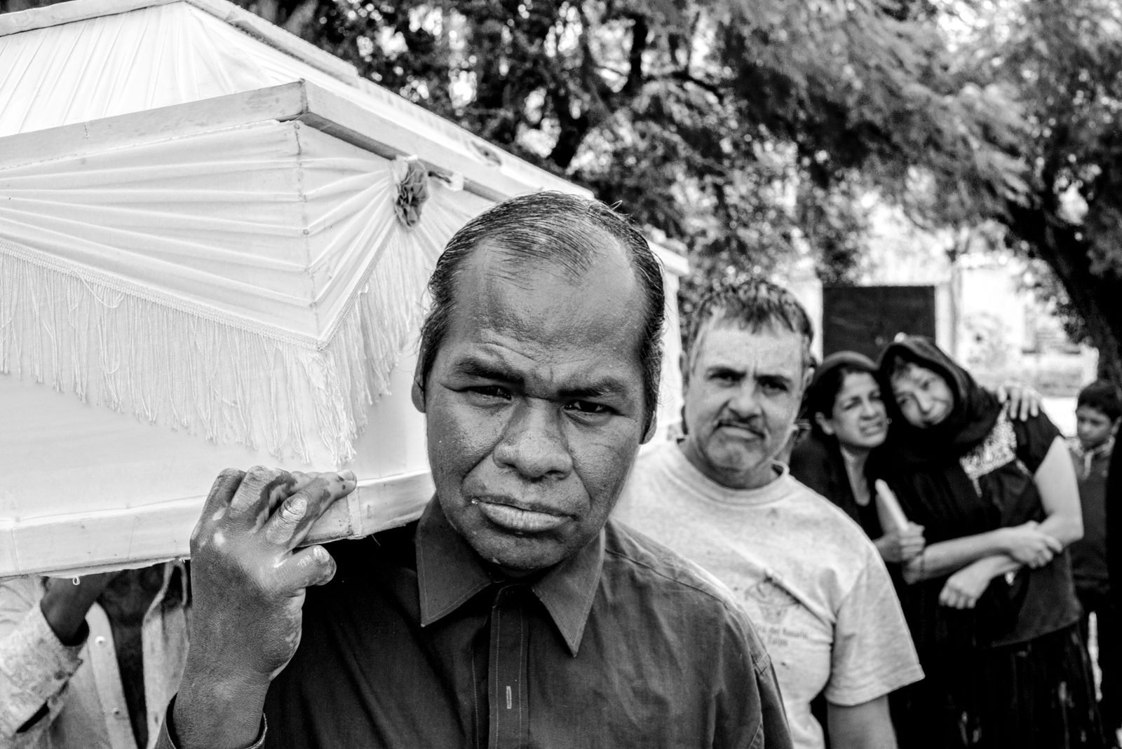 © Eduardo Moreno - Marching with sad face and bug sorrow in the paved street