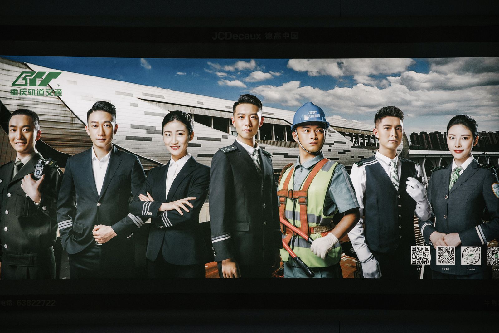 © Tianhu Yuan - Crews. Lightbox advertisement in the station depicts the crews of railway. They change the way of travels in the city.