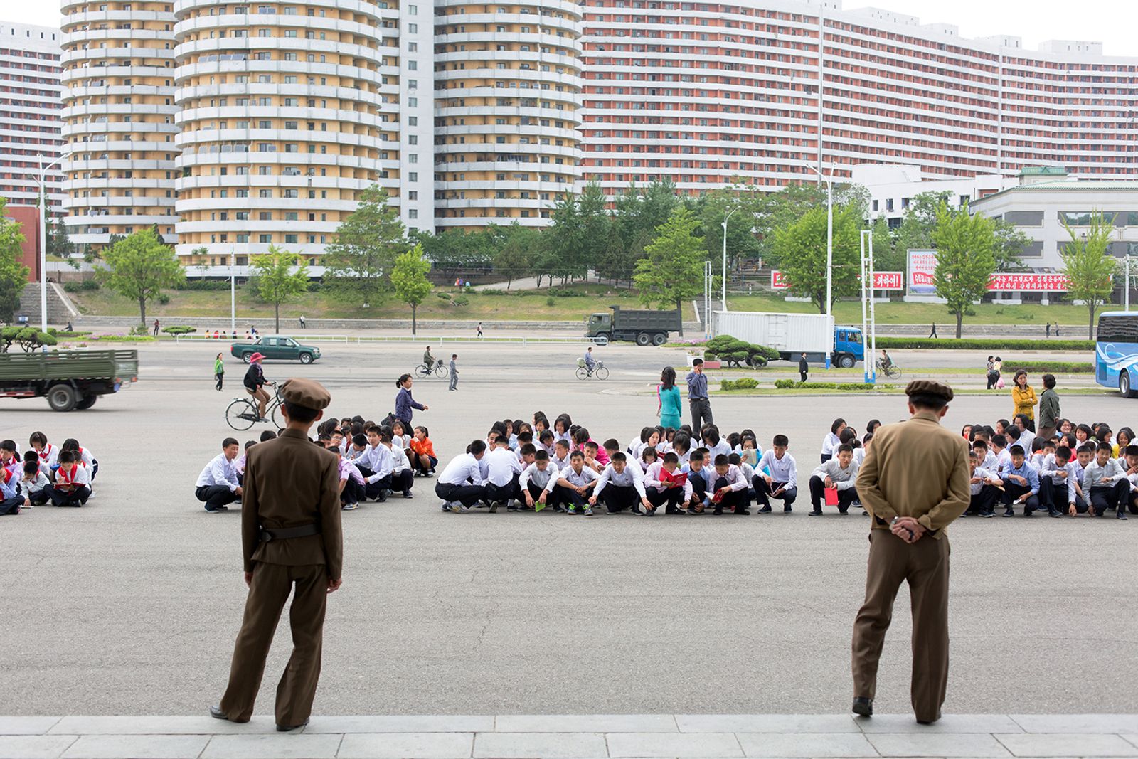 © Filippo Venturi - Korean students while studying in the Pyongyang Circus Square, as they wait for the show to begin.