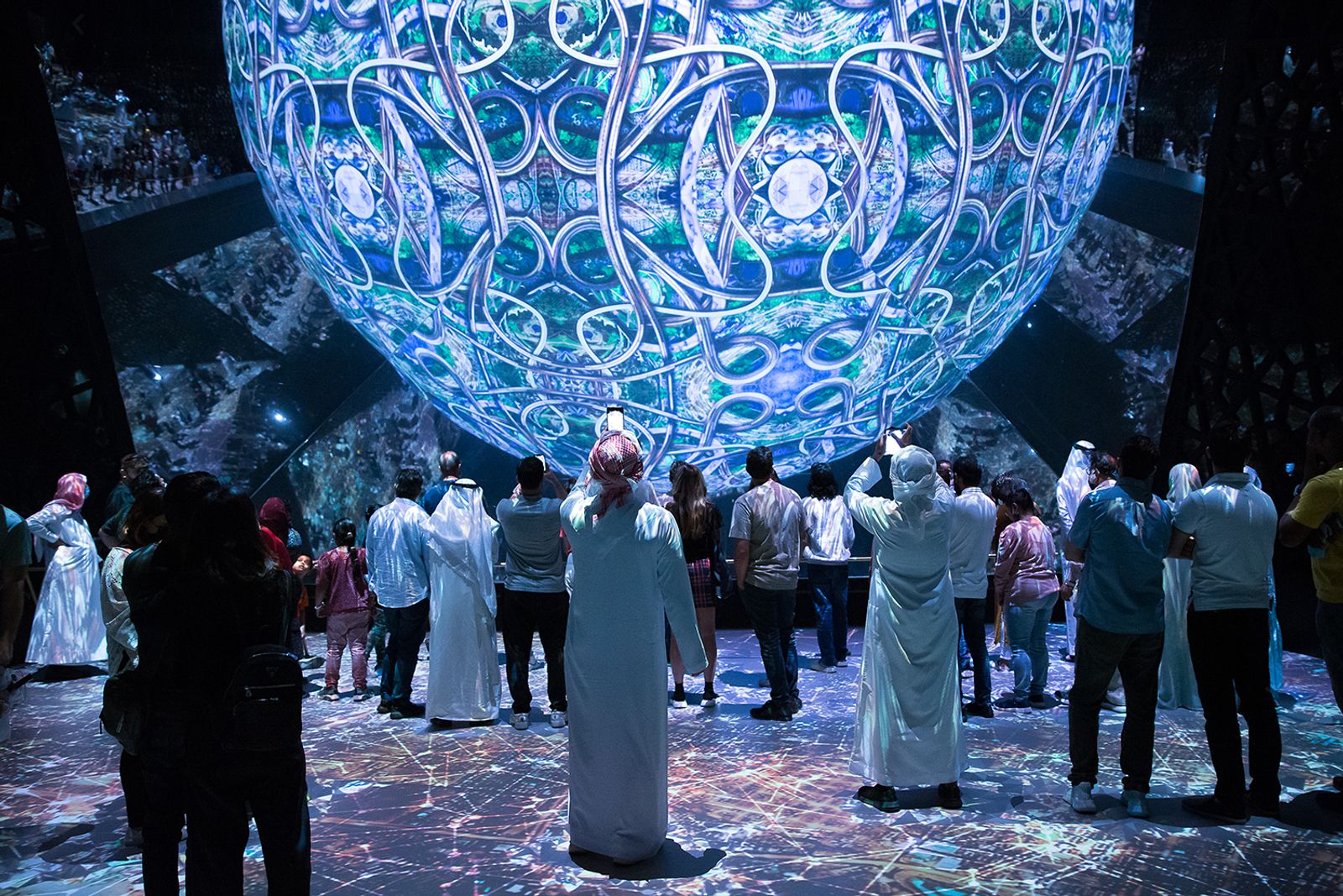 © Filippo Venturi - Visitors during a three-dimensional projection inside a room of the Saudi Arabia Pavilion. Expo 2020, Dubai, 2021.