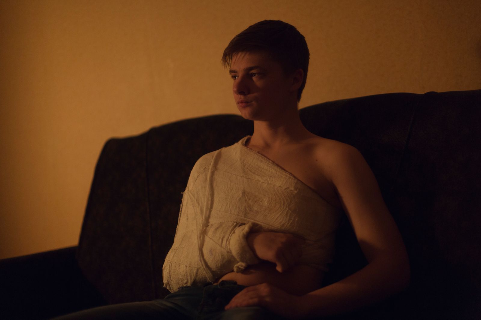 © Kyrre Lien - Nikita, a student in Donetsk a late night. He got in a fight on New Years Eve, which didn't end well.