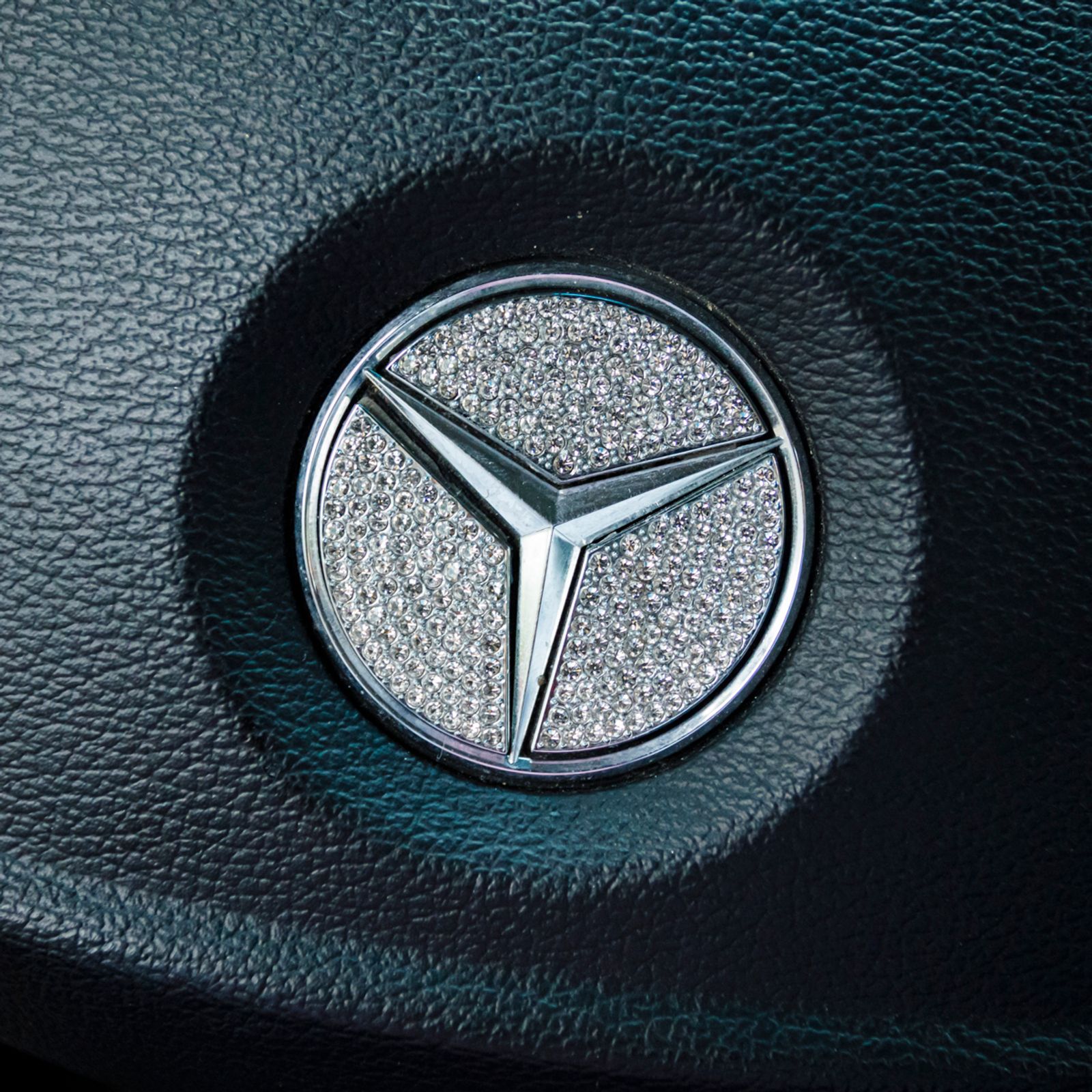 © Johanna Maria Fritz - The Mercedes star on Mihaela’s steering wheel is decorated with rhinestones. Mogoșoaia, Romania, 2019.