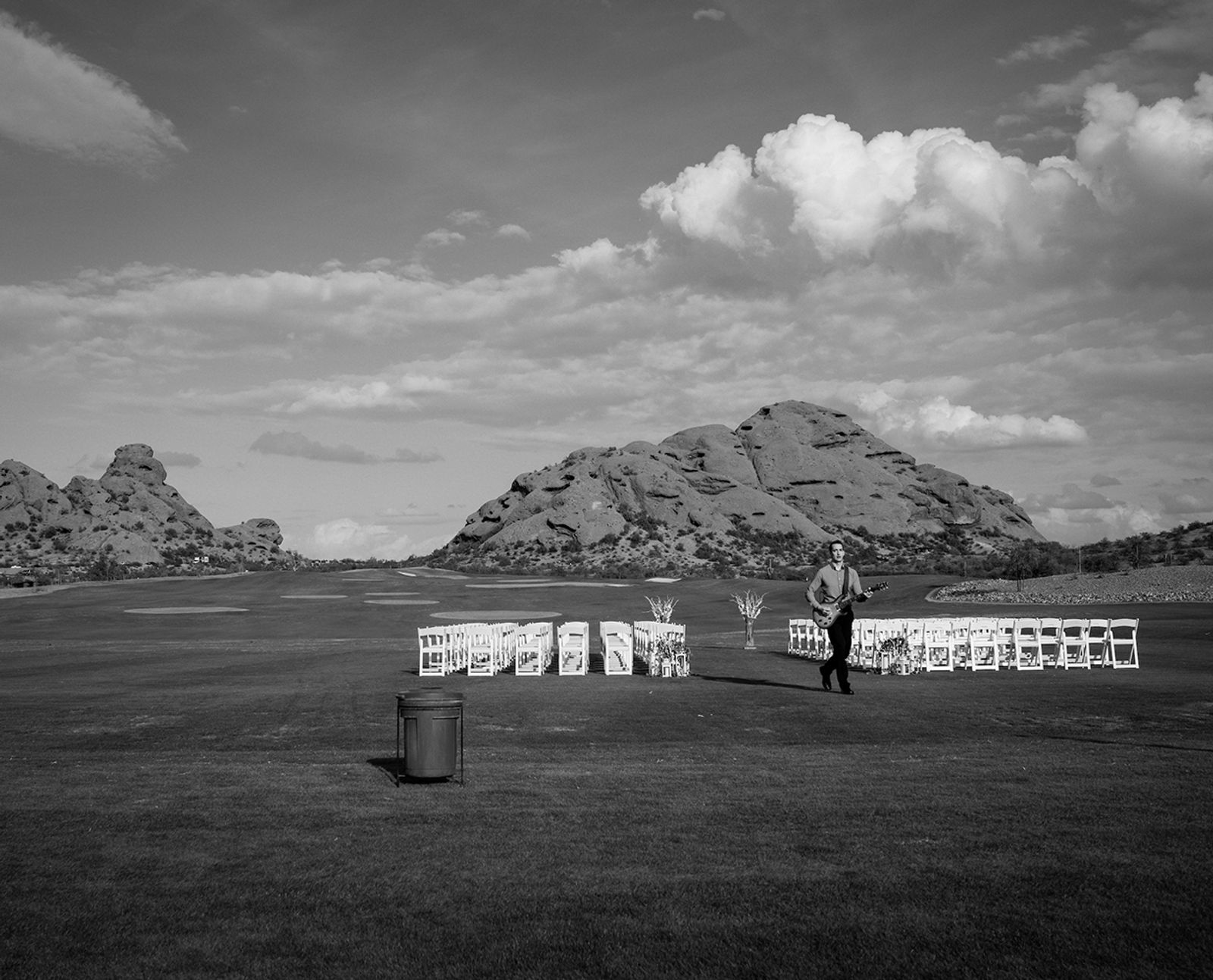 © John Trotter - Setting up the sound system for an outdoor December wedding at the Papago Golf Course, in Phoenix, Arizona,.