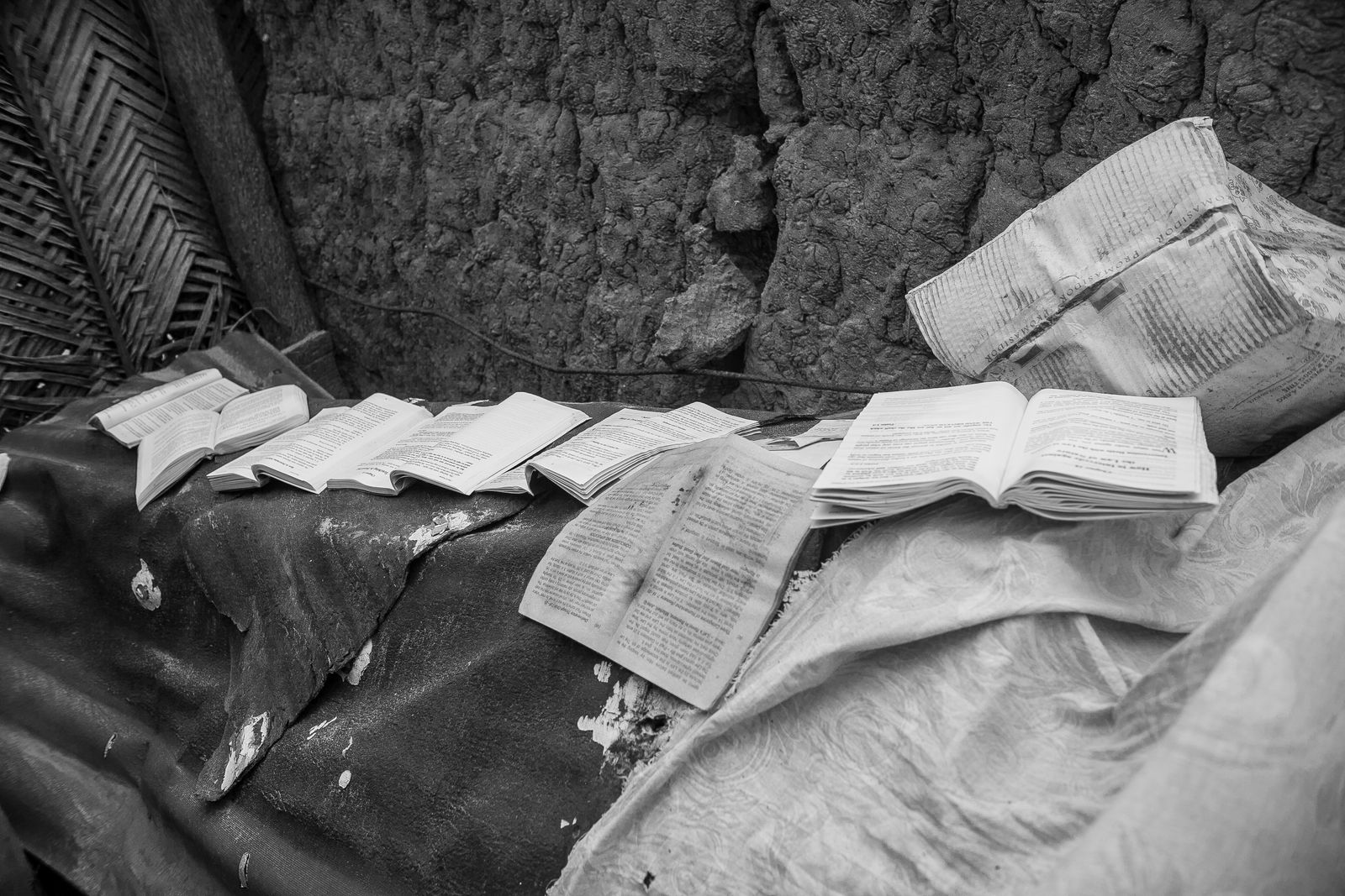 © Ofoe Amegavie - School books left to dry in the sun after flooding caused by a storm and high tide in Azizakpe.