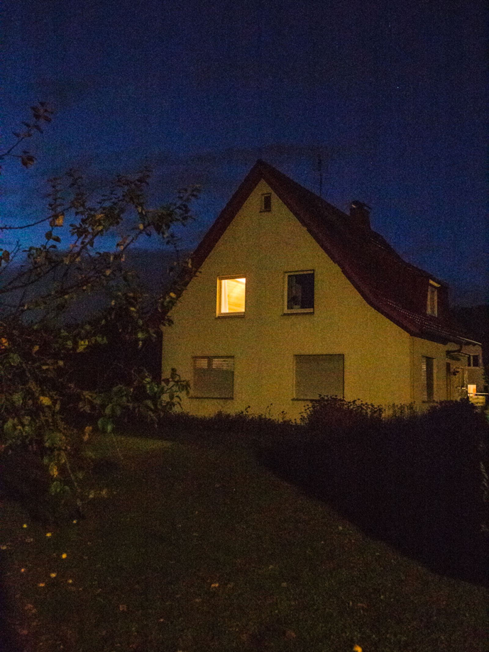 © Lea Franke - "The house where Lars lives at night, his room is brightly lit"