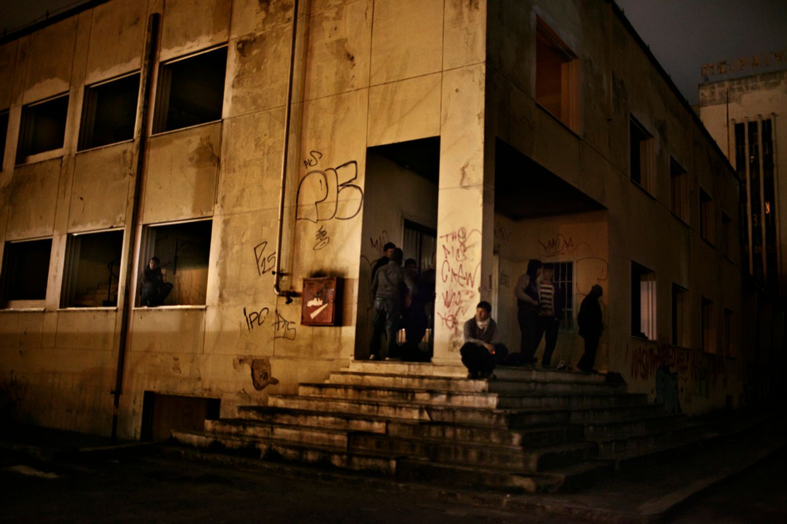 © Alessandro Penso - 2012. Patras. Greece. Migrants in an occupied factory in Patras.