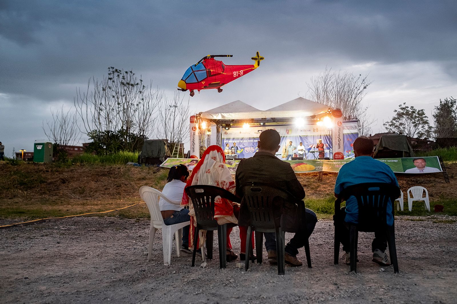 © Paolo Patrizi - A family awaits the beginning of a concert during the new year holidays. An event organised by the Dhuumcatu Association