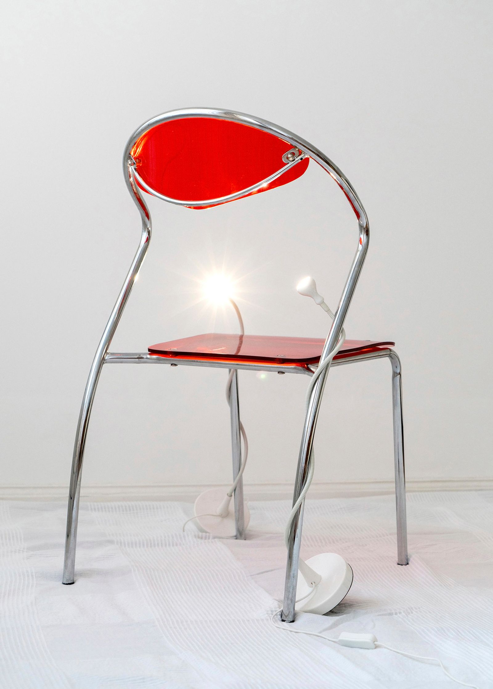 © Moritz Jekat - Chair and Bending Lights