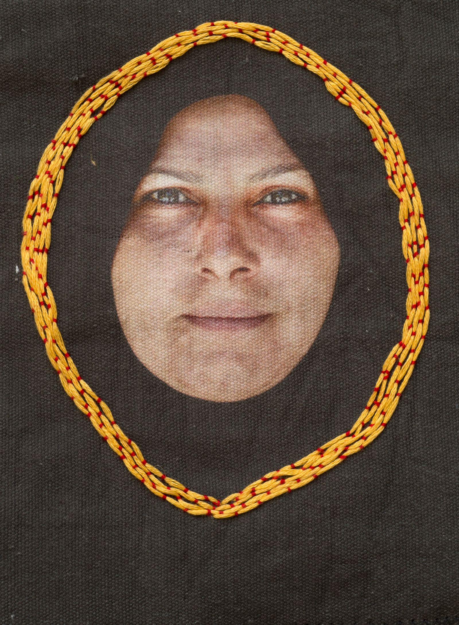 © Jennifer Matthews - Iraq hanging detail - Portrait of Um Mohammed, with embroidery