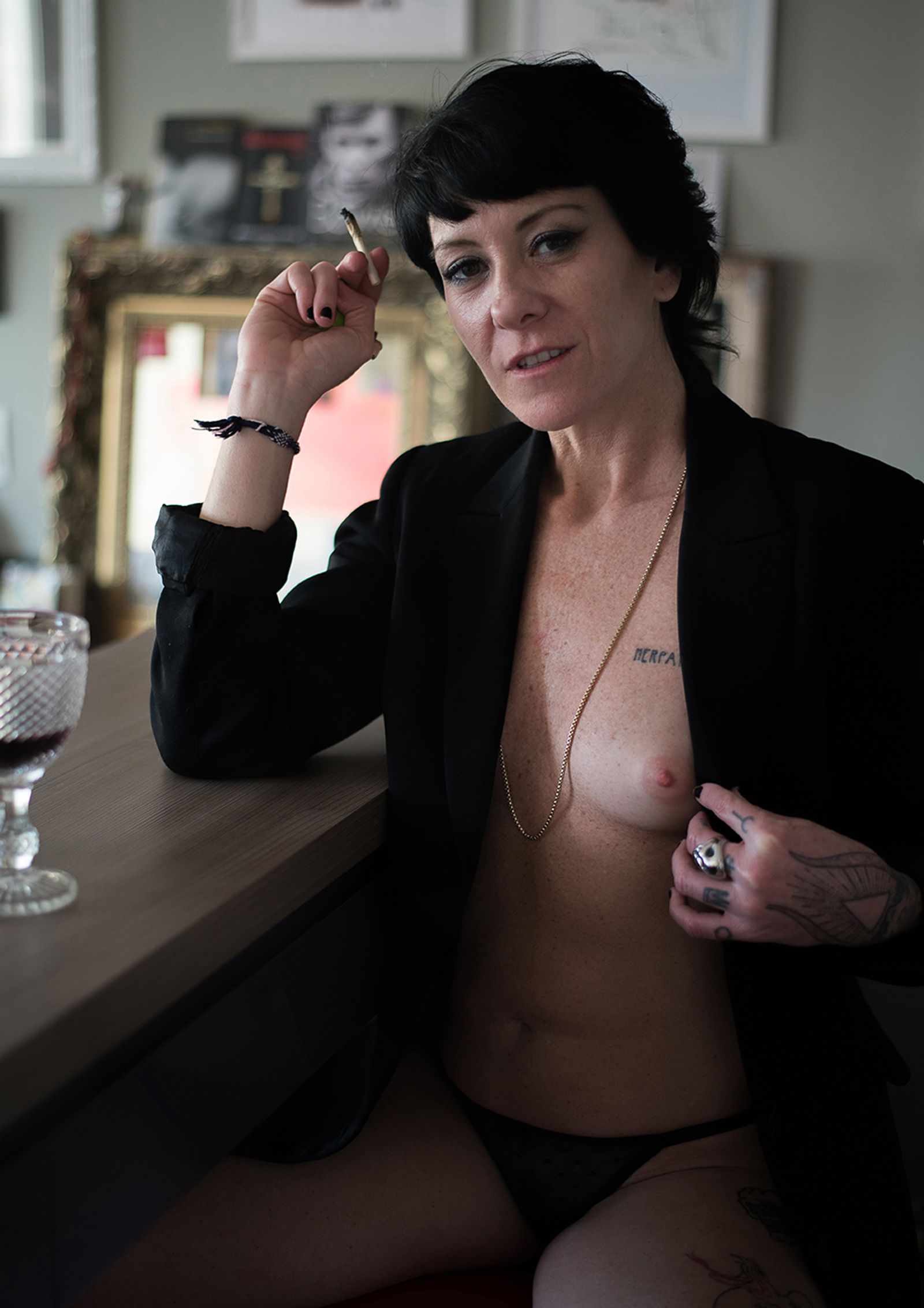 © Camila Falcão - Abhiyana shows a boob while smoking a joint and drinking wine