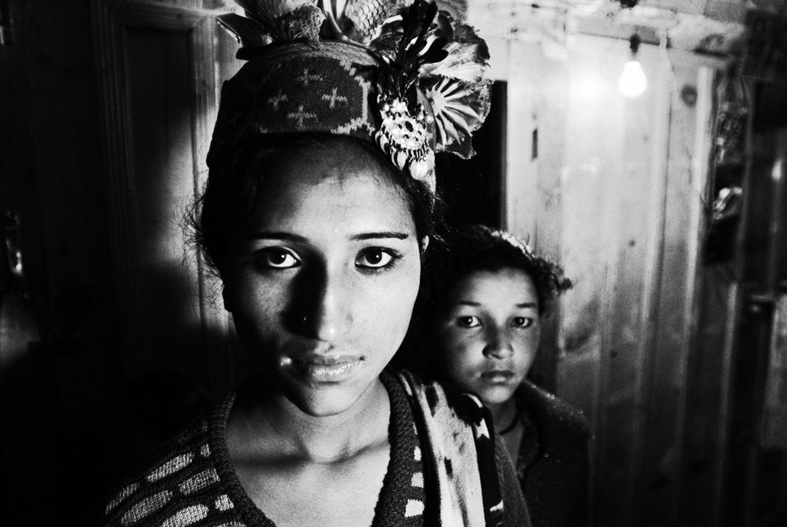 © Harikrishna Katragadda - Young girls eagerly anticipate for the wedding ceremony.