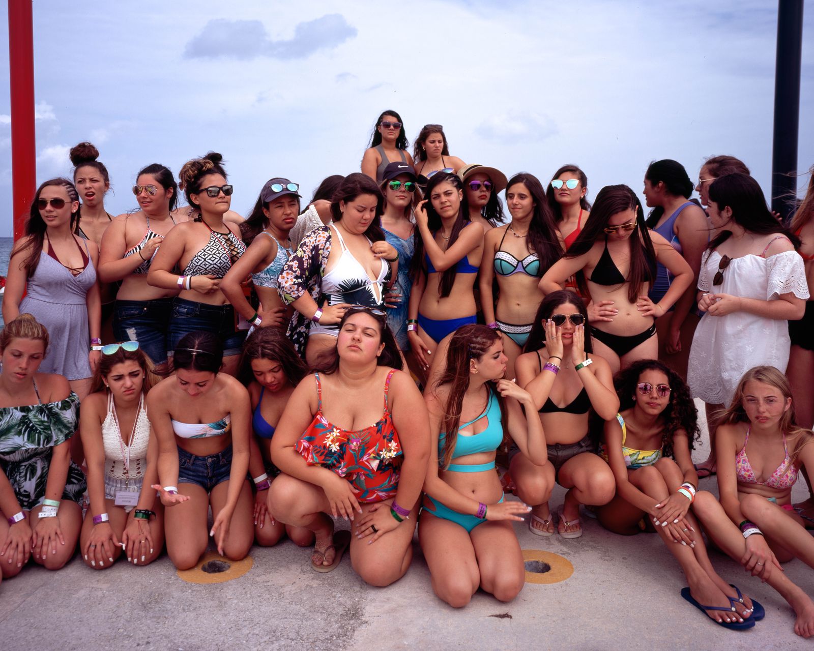 © Samantha Cabrera Friend - Quinceañera's pose for a group portrait in the cruise's final stop of Cozumel, MX