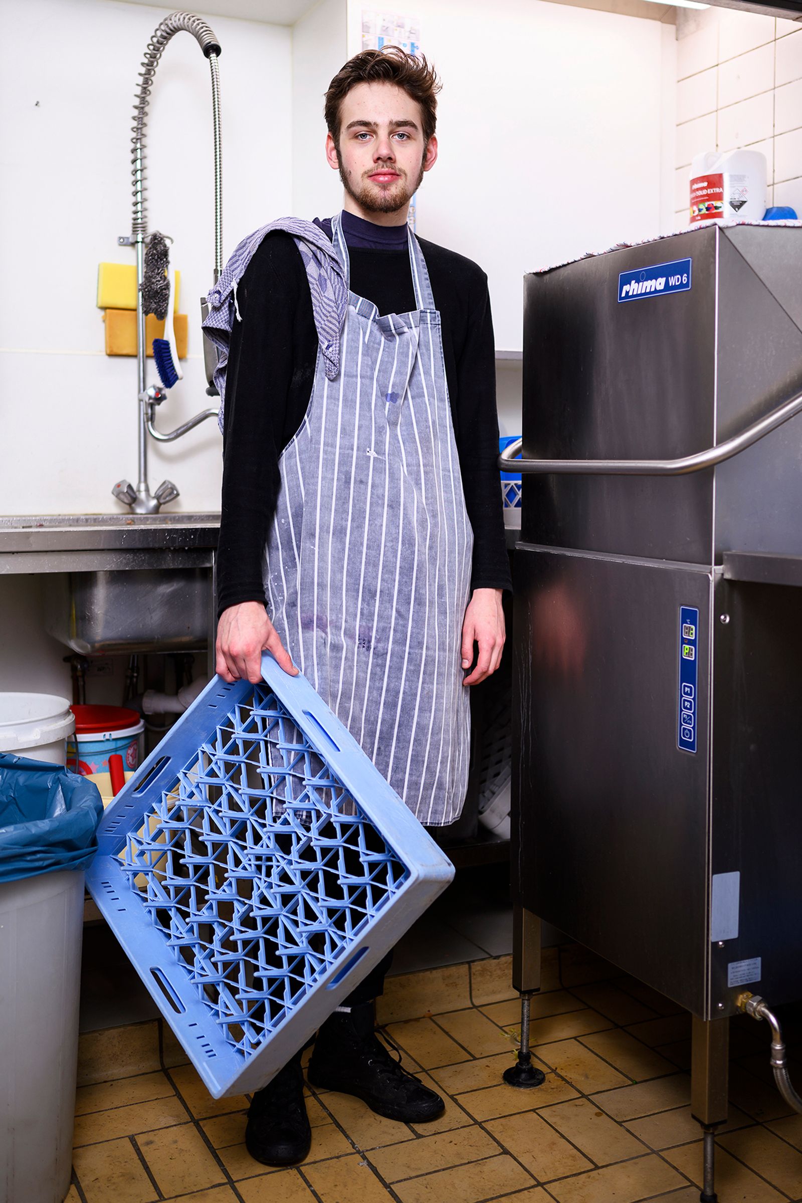 © Els Zweerink - Sammie works as a dishwasher in the restaurant.