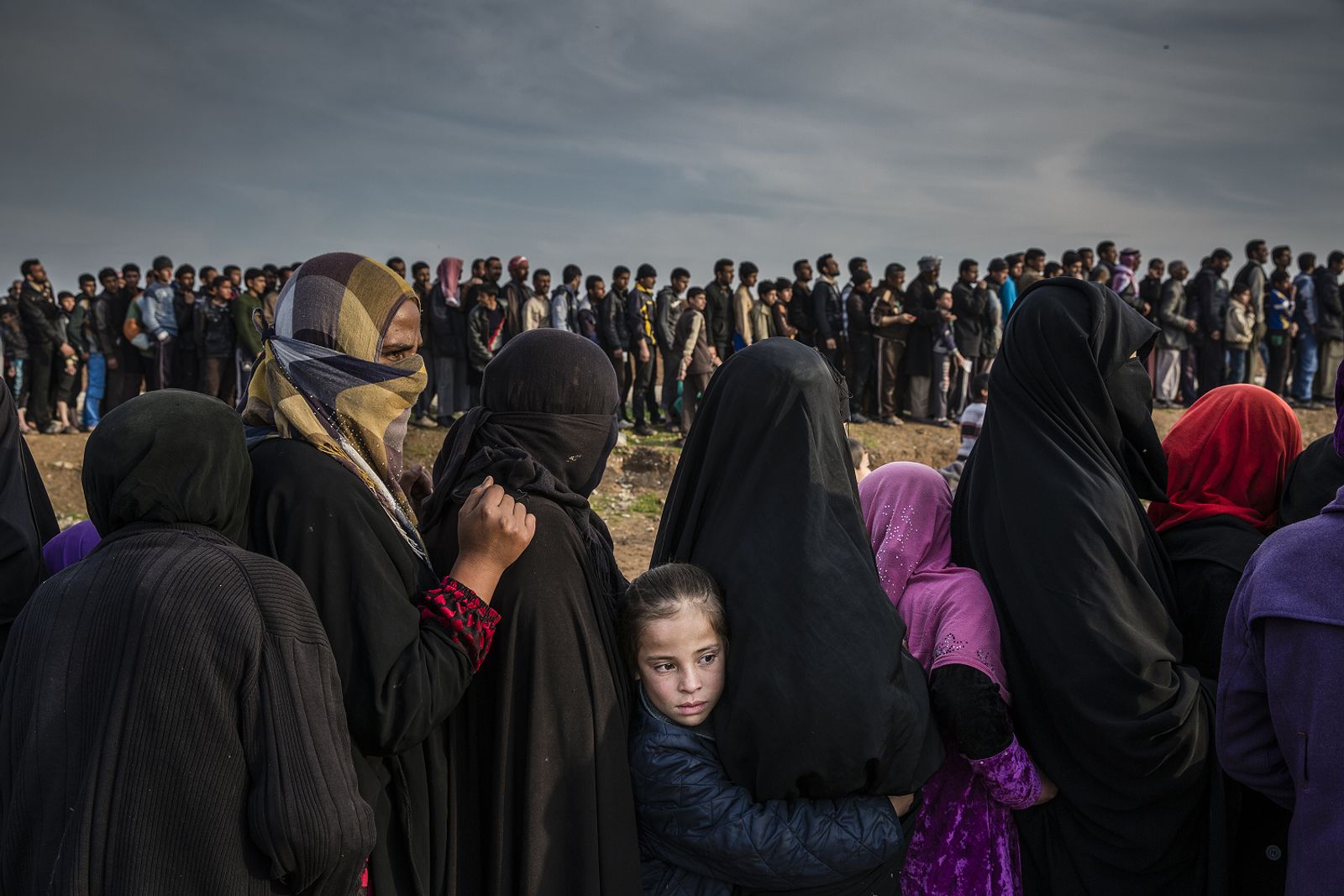 The Battle for Mosul - Lined Up for an Aid Distribution