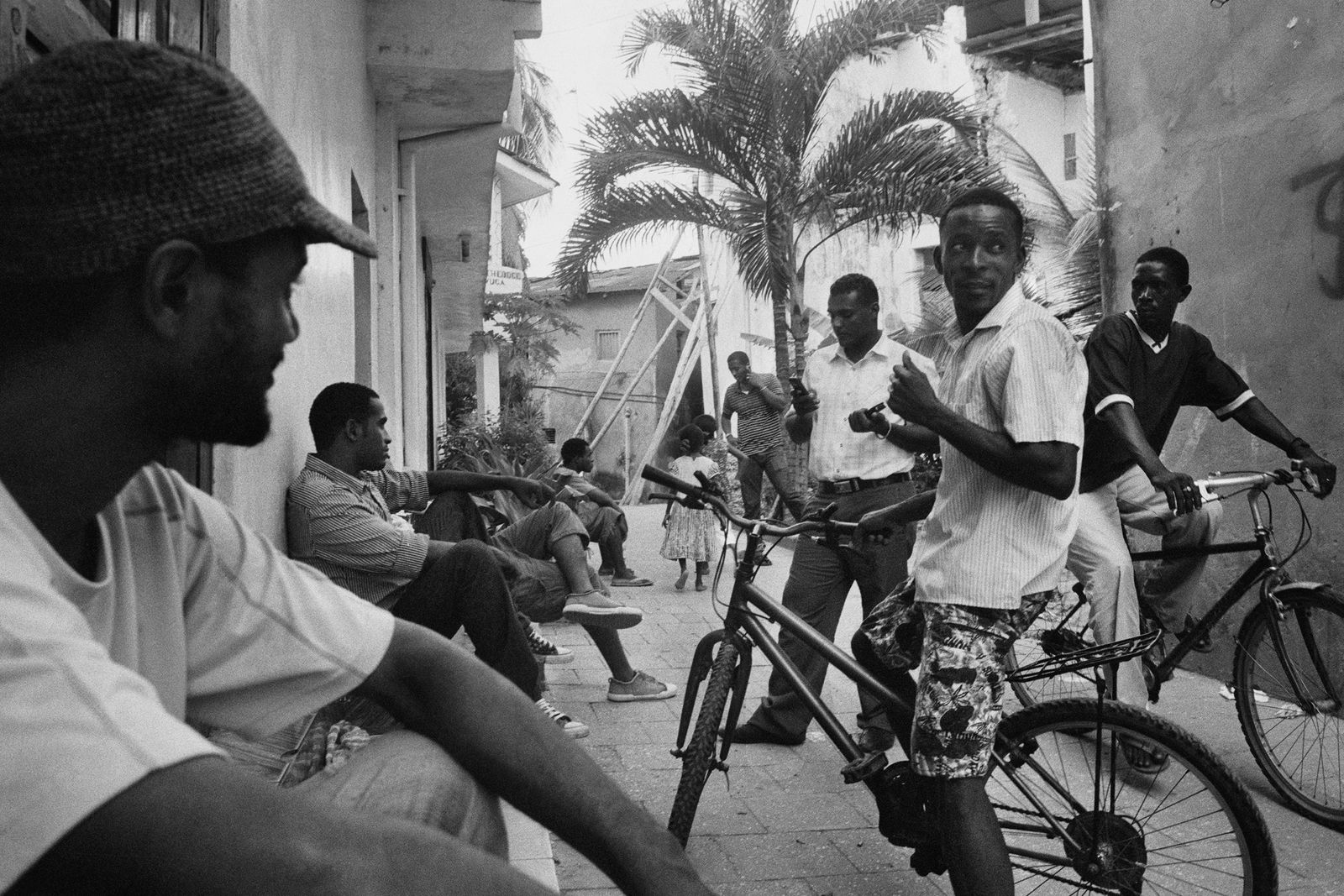 © Ania Gruca - Group of young men socializing in the streets of Stone Town, March 2010.