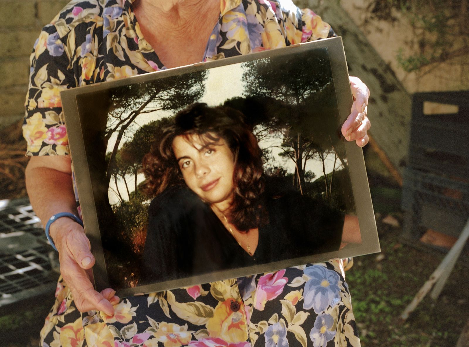 © Emanuele Moi - My grandma holding a portrait of my mum