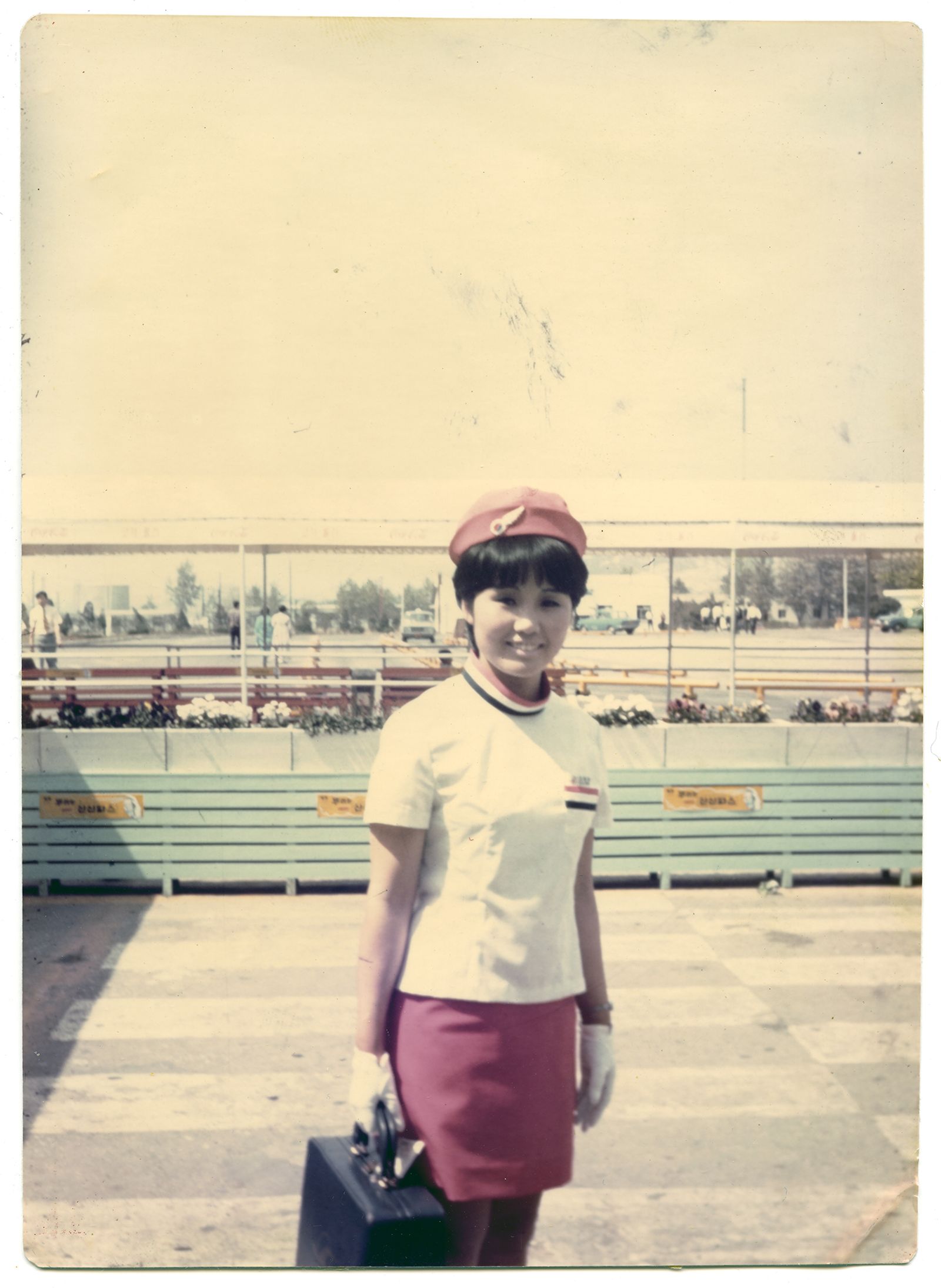 © Lee Grant - My mother in her Korean Airlines uniform before a shift.