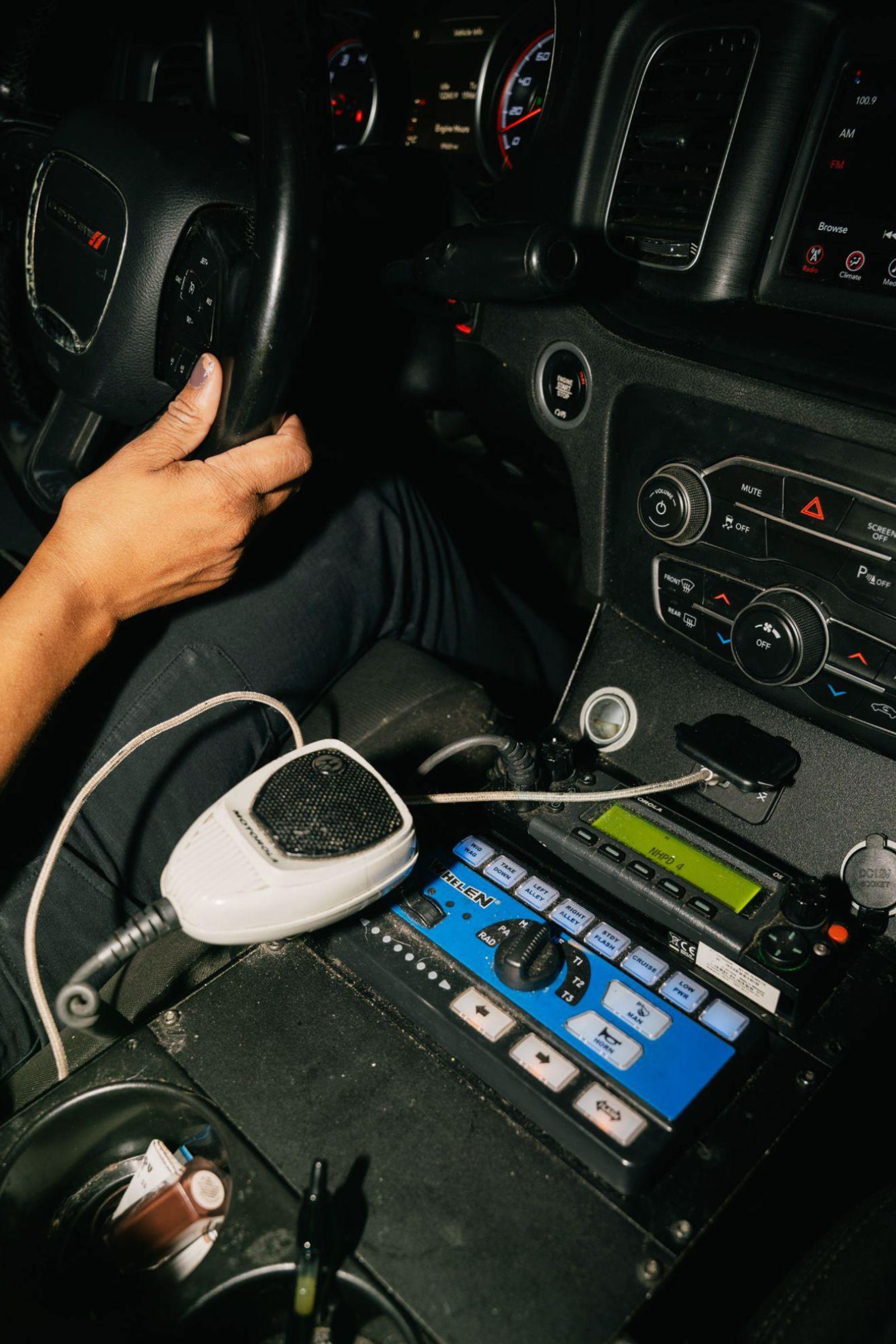 © Paola Chapdelaine - New Haven. July 25, 2024. Inside of officer Nikky Curry’s police car (victim services).