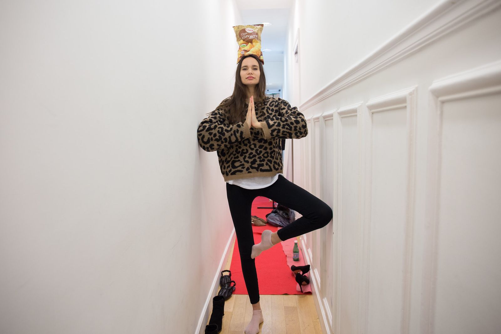 © Claudia Cuomo - Sveta being funny at the camera. The corridor/backstage of showroom is very narrow.