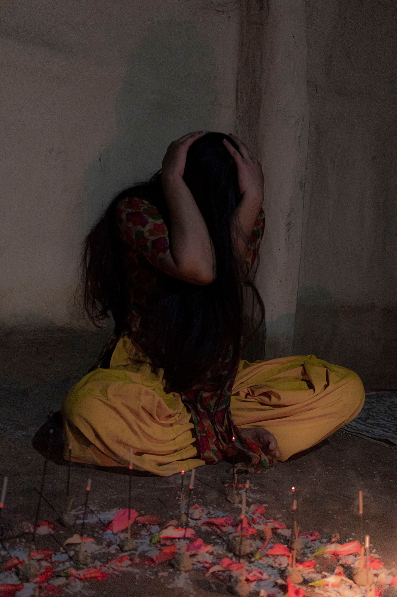 © Pietro Lo Casto - Young girl in a state of trance during a Shamanic ceremony.