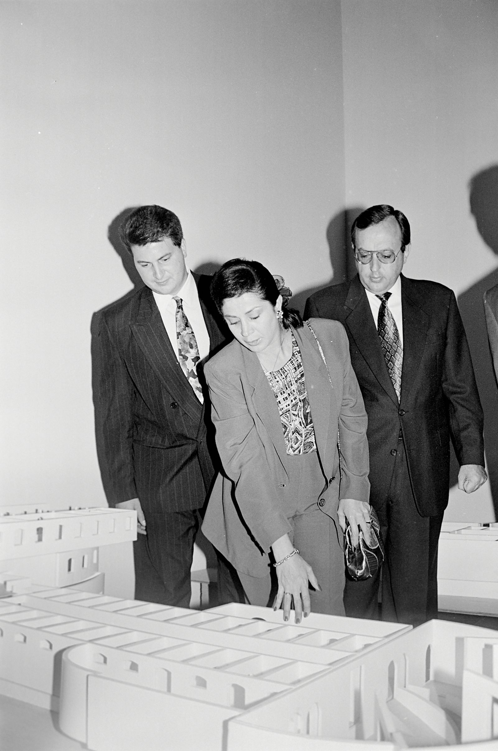 © Joel Jimenez - n.d. Public officials supervising the construction model of the prison’s transformation into the Children’s Museum.