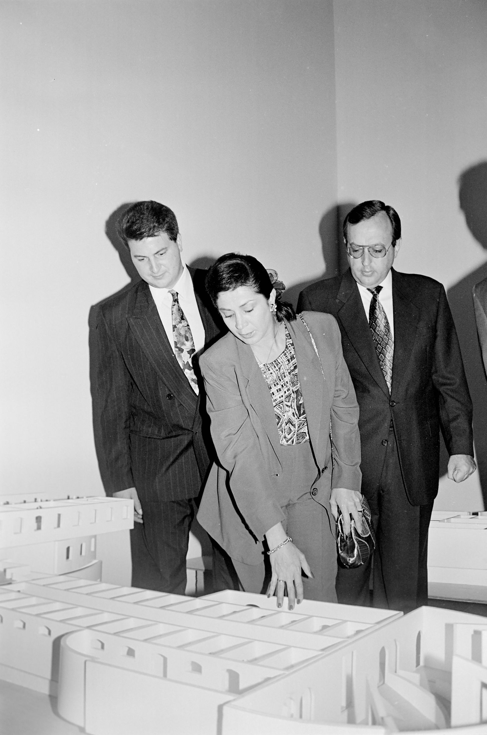 © Joel Jimenez - n.d. Public officials oversee the building model of the prison transformation into the Children's Museum.