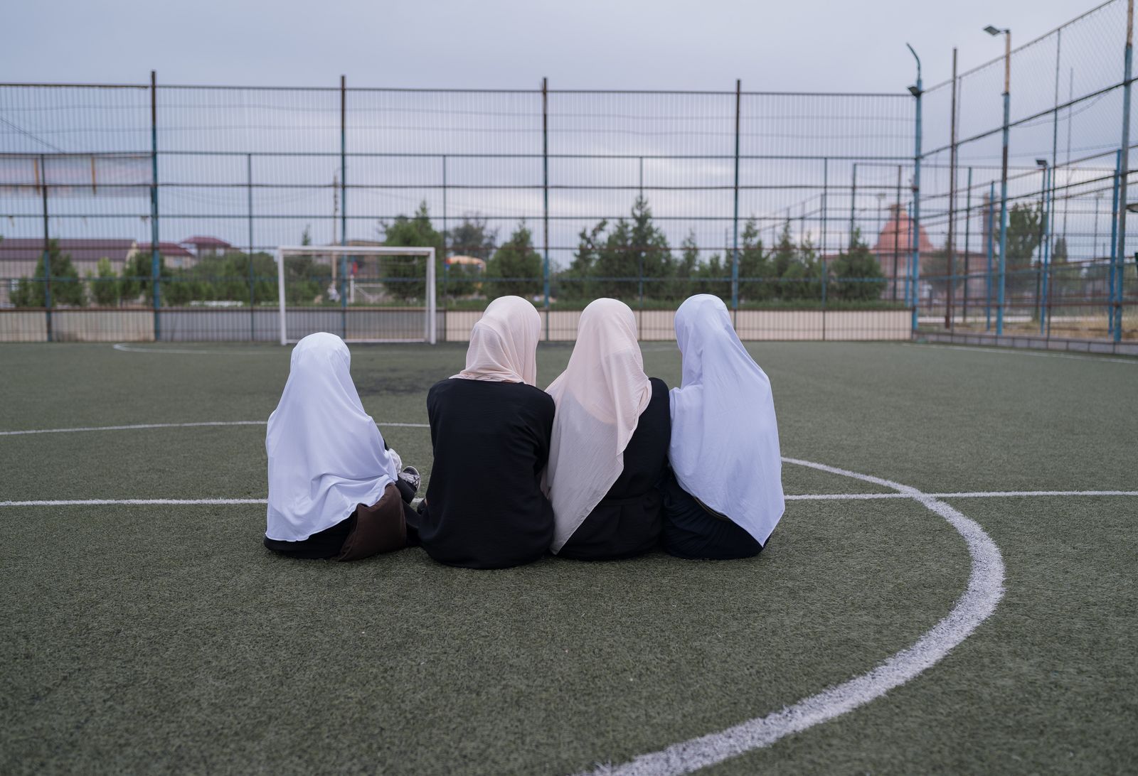 © Gadjieva Madina - The students are having a rest on the football field opposite the madrasa building in the village of Manaskent.