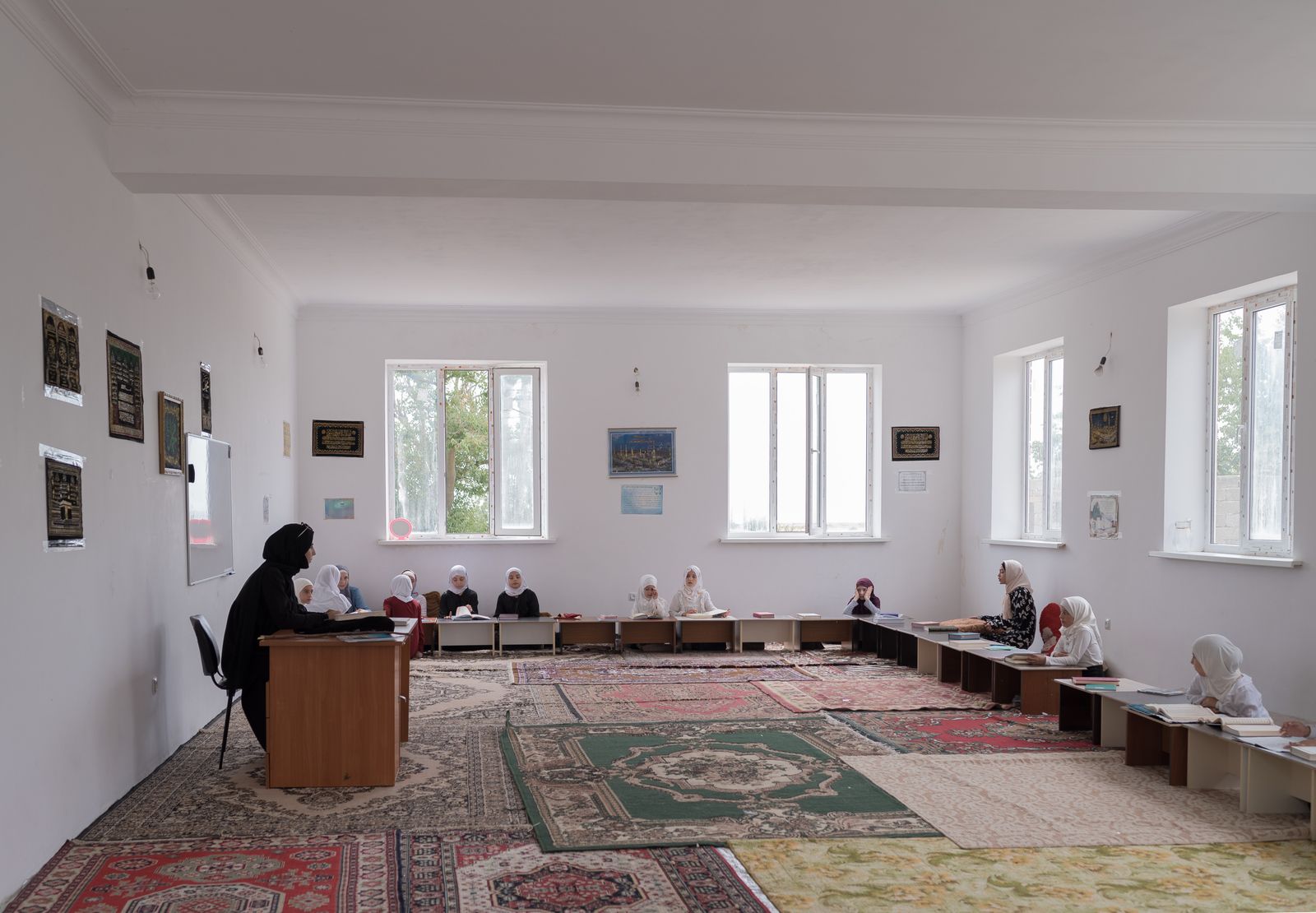 © Gadjieva Madina - The lesson on learning the Koran at madrasa in the village of Manaskent.