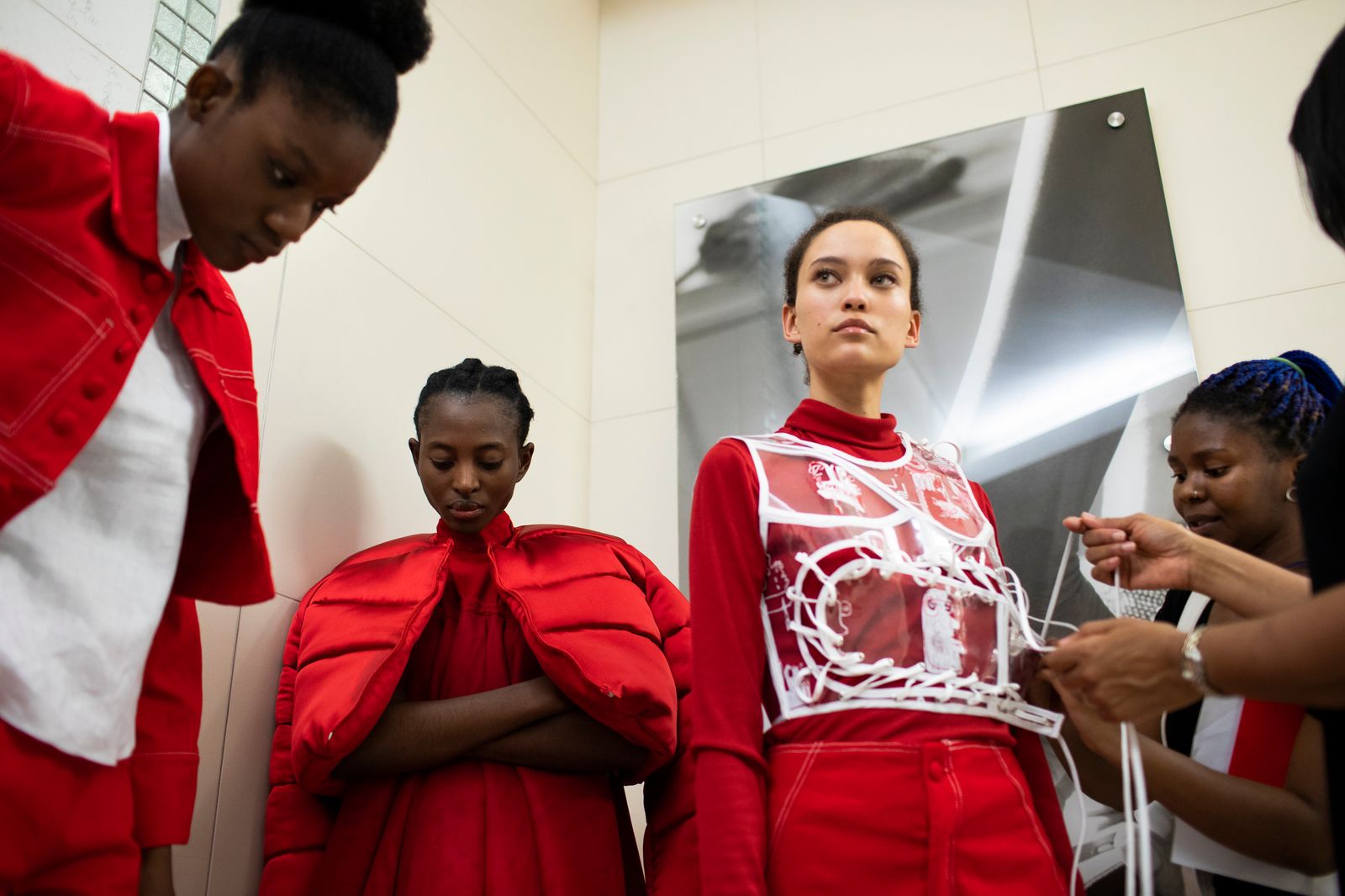 © Ilvy Njiokiktjien - Models wait in line during a contest of the South African Fashion Week in Johannesburg, South Africa.